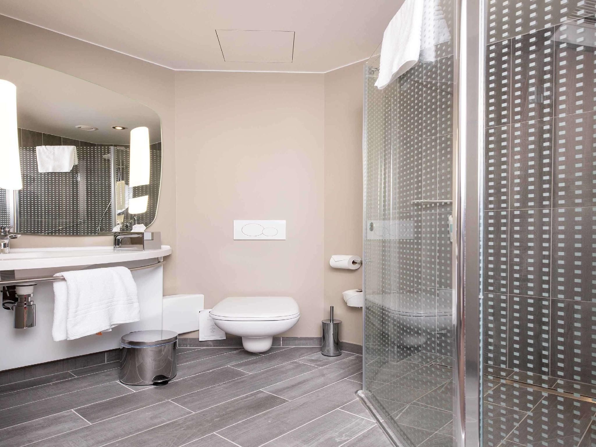 Room with one big bed and sofa