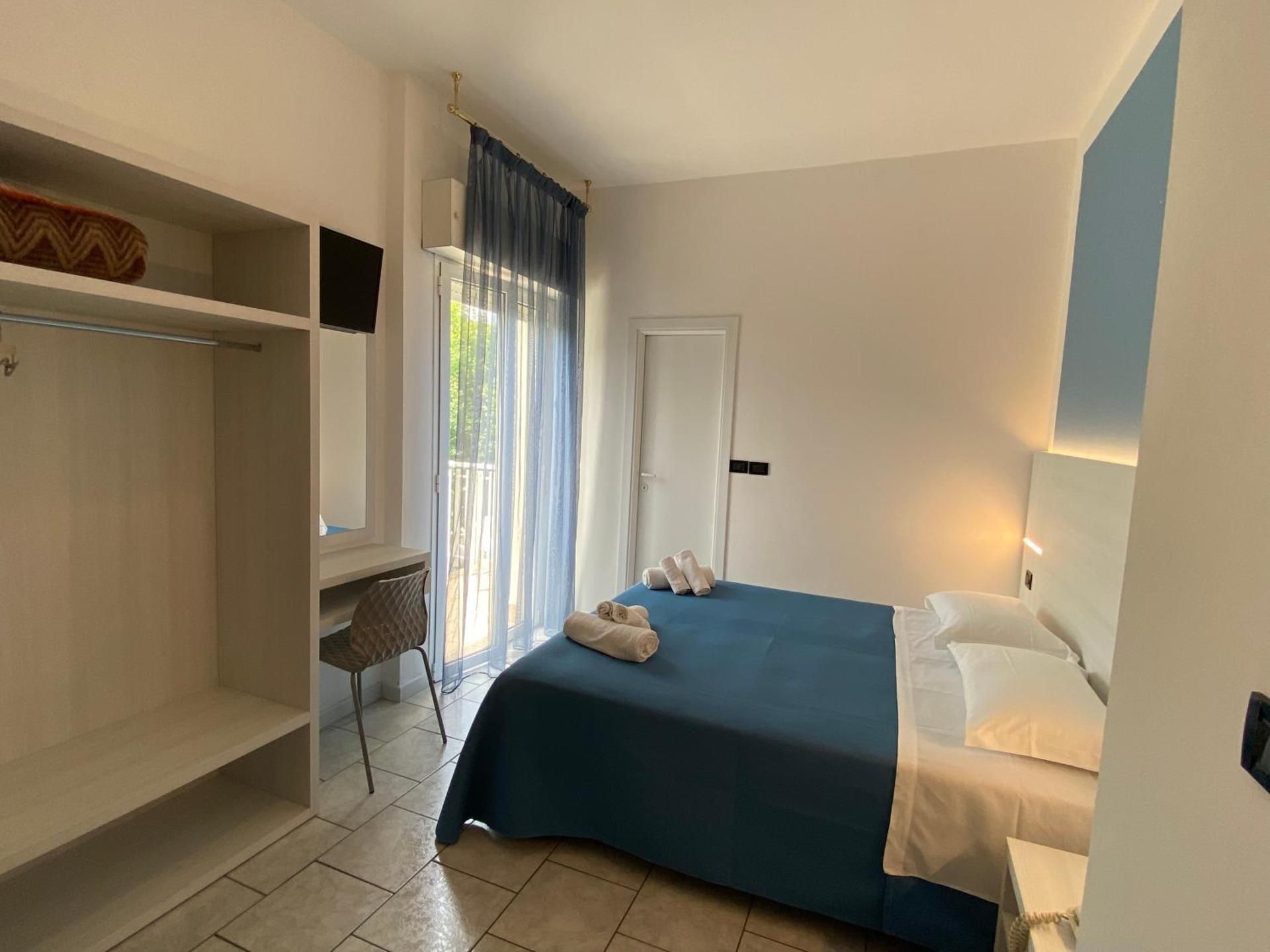 Quadruple Room with Balcony