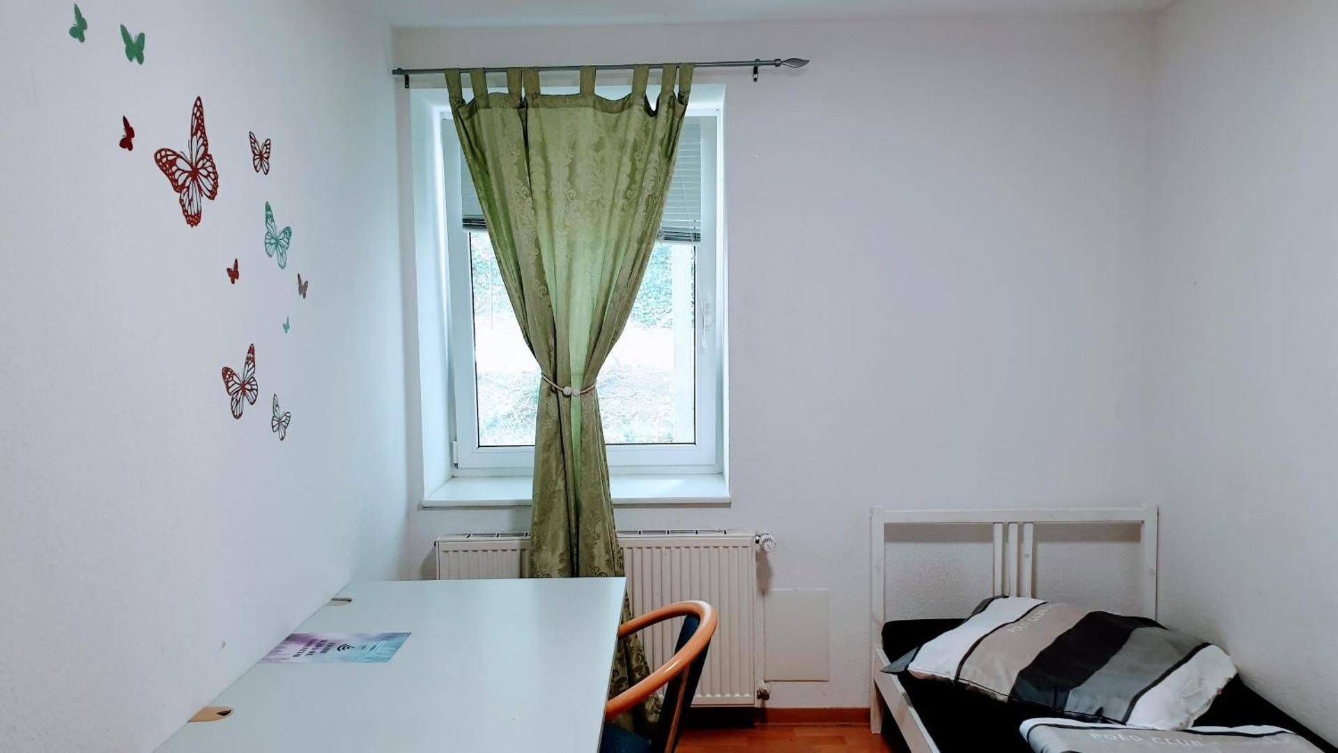 Single Room with Shared Shower and Toilet