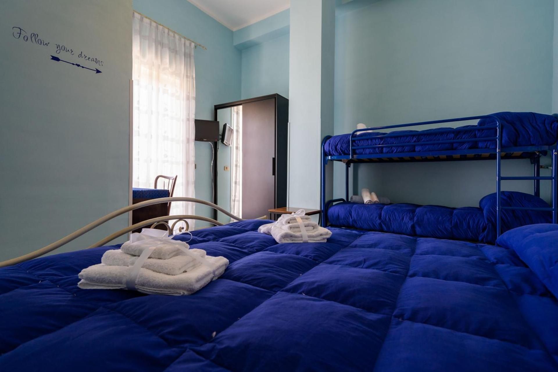 Quadruple Room with Private Bathroom