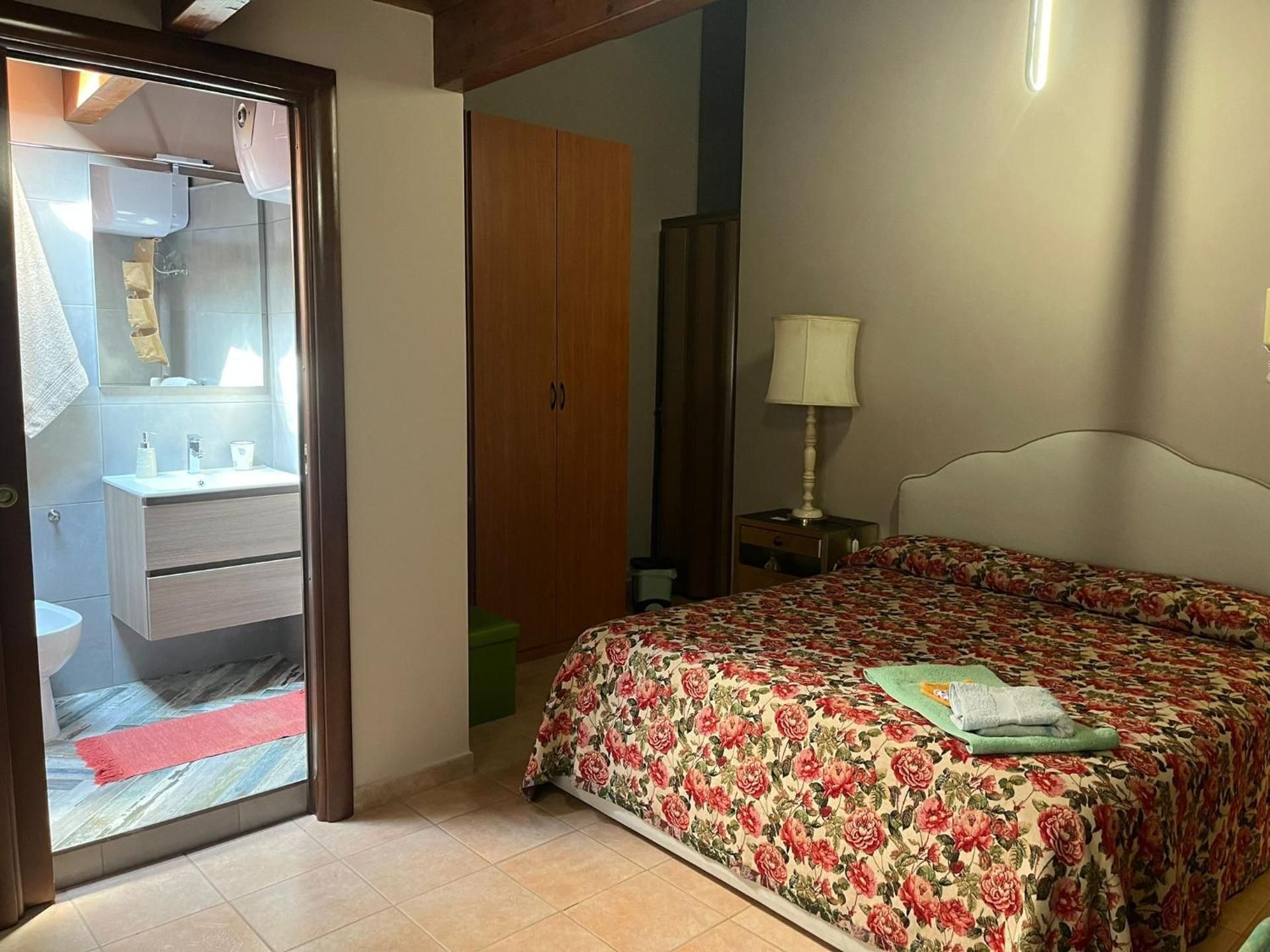 Quadruple Room with Private Bathroom