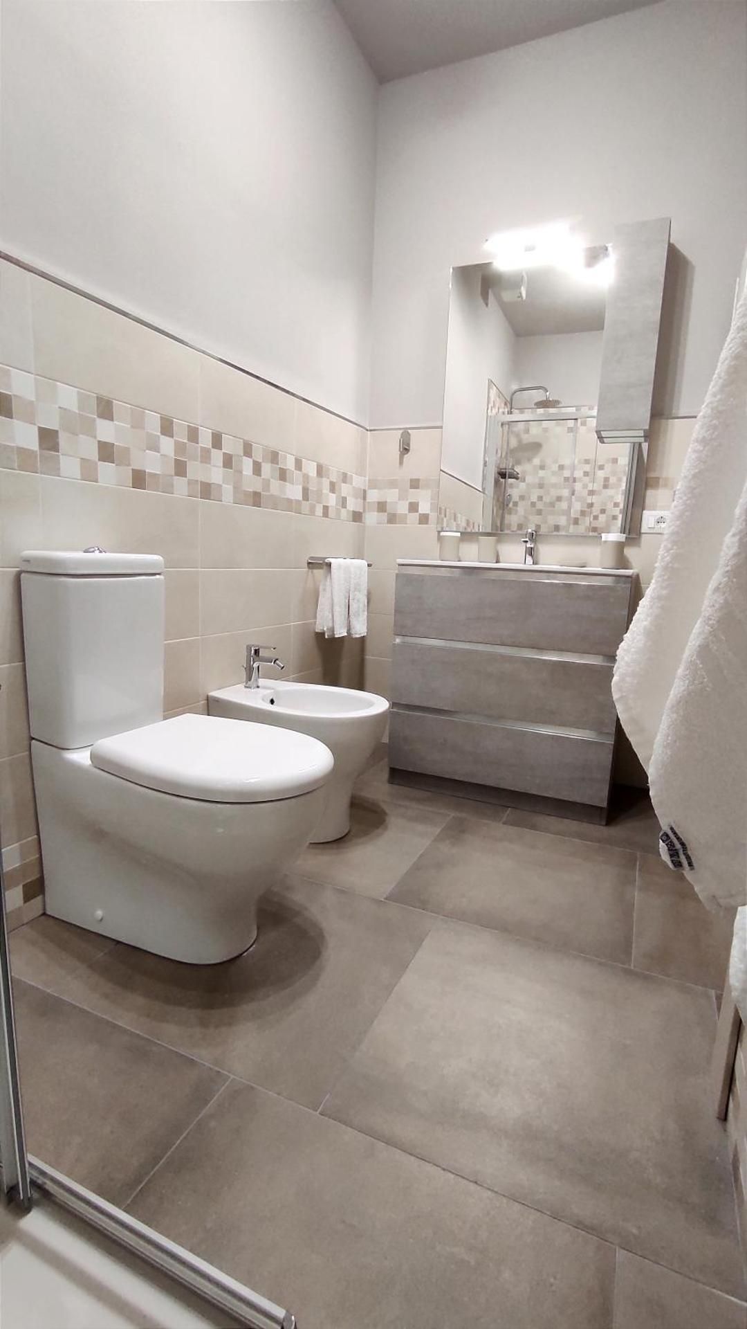 Quadruple Room with Private Bathroom