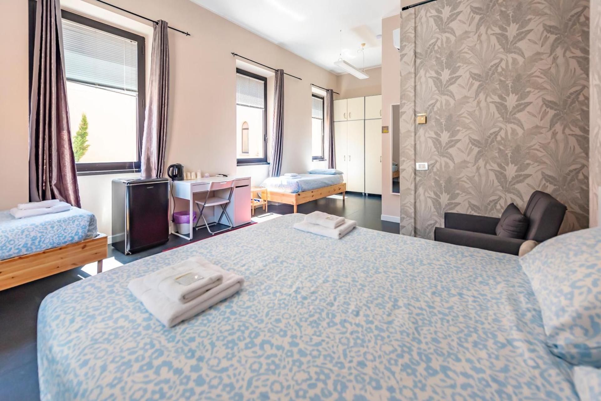 Quadruple Room with Private Bathroom