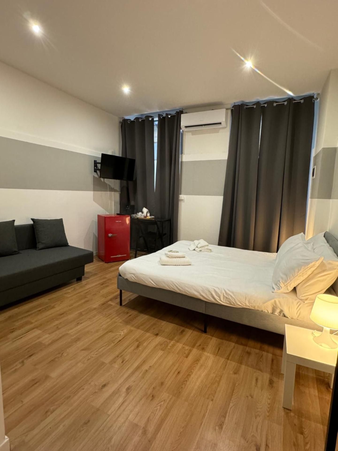 Quadruple Room with Private Bathroom