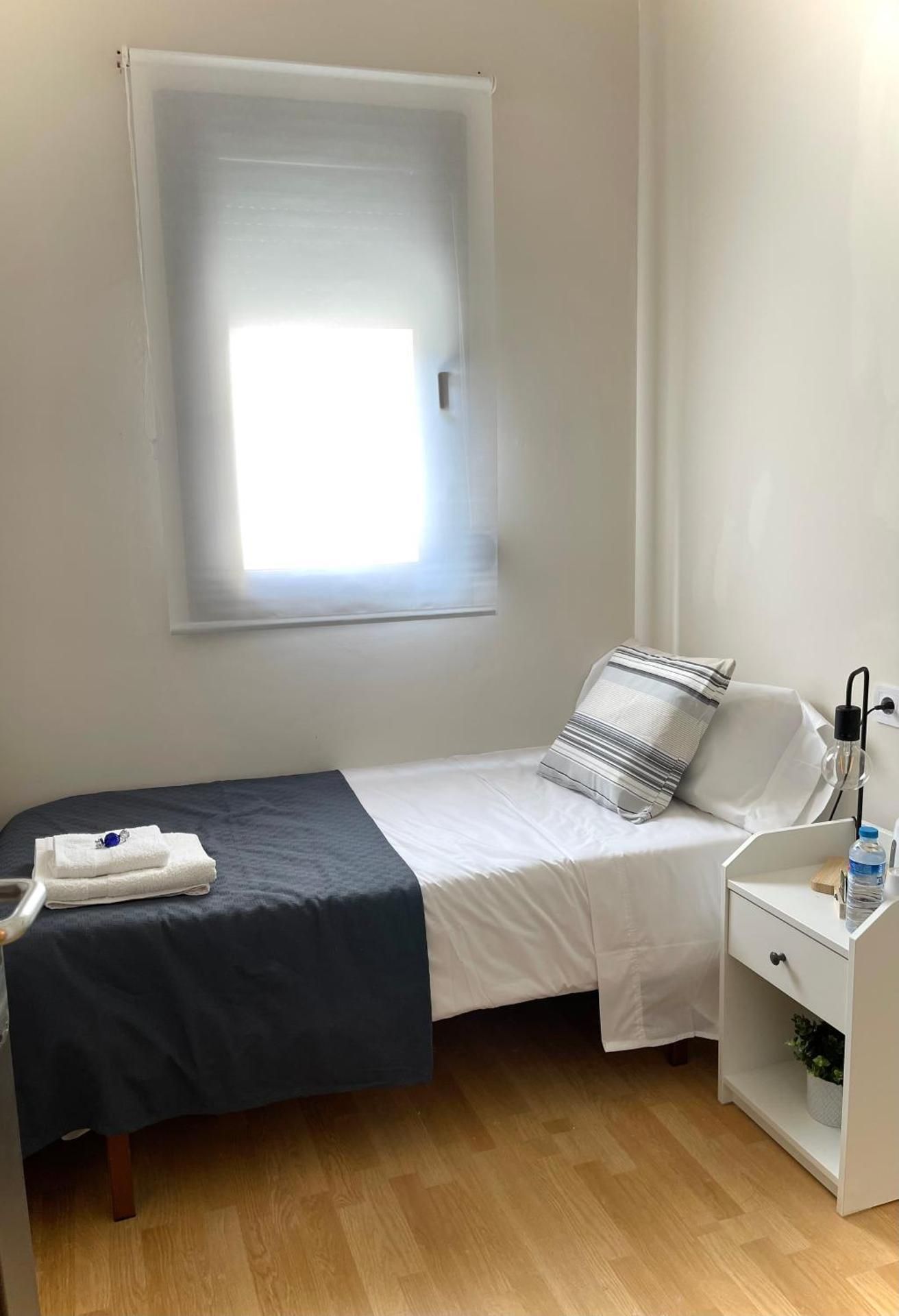 Single Room with Shared Shower and Toilet