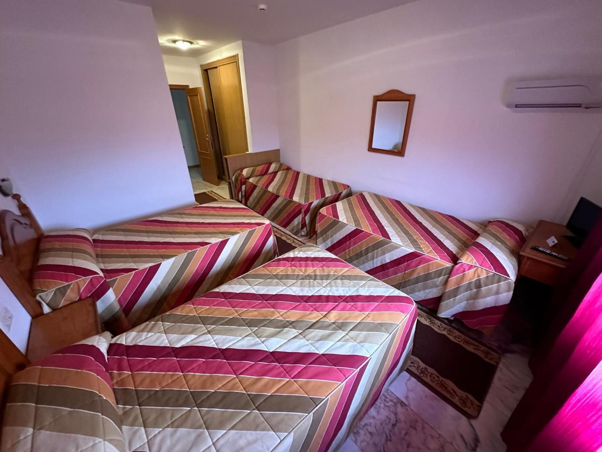 Quadruple Room with Private Bathroom