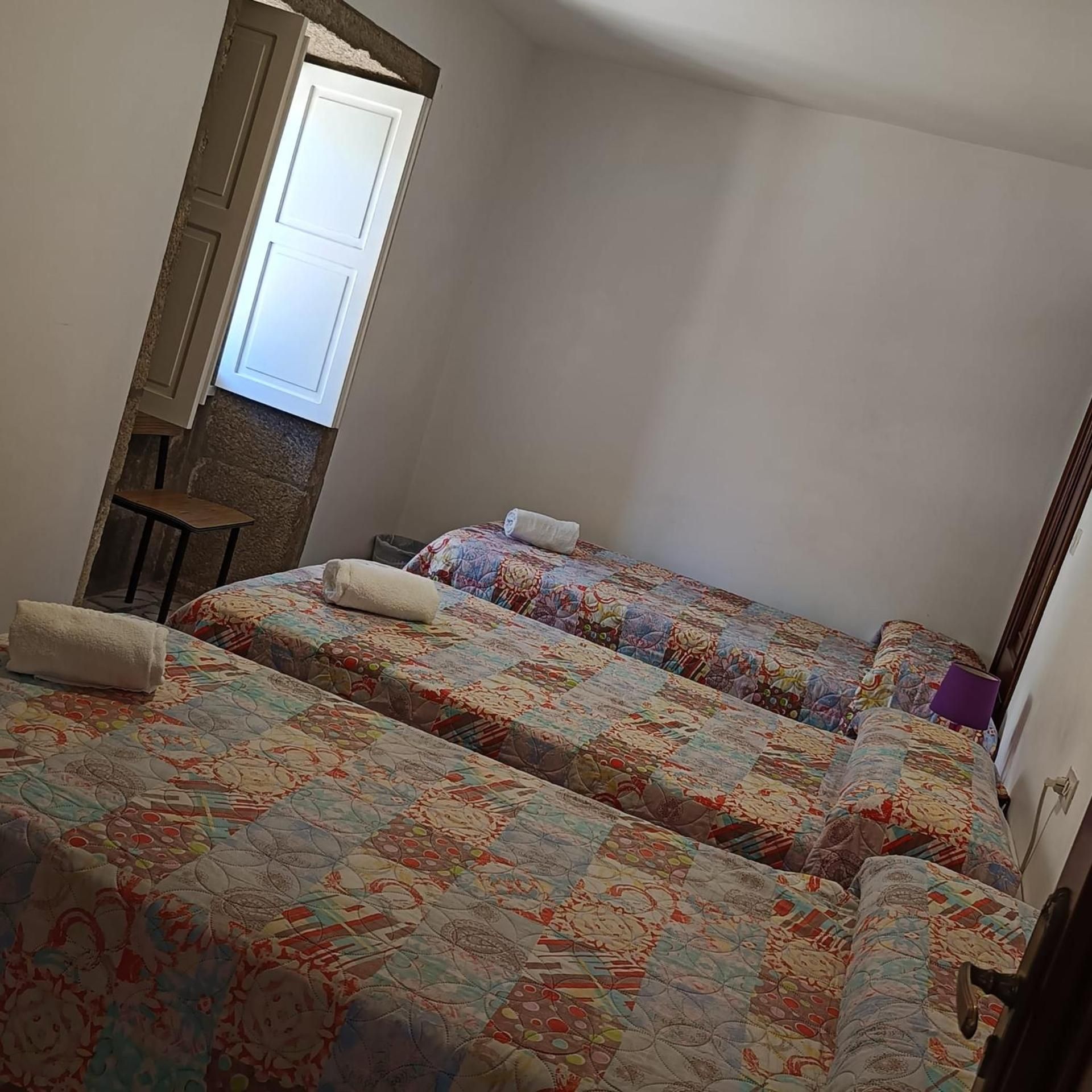 Basic Triple Room with Shared Bathroom