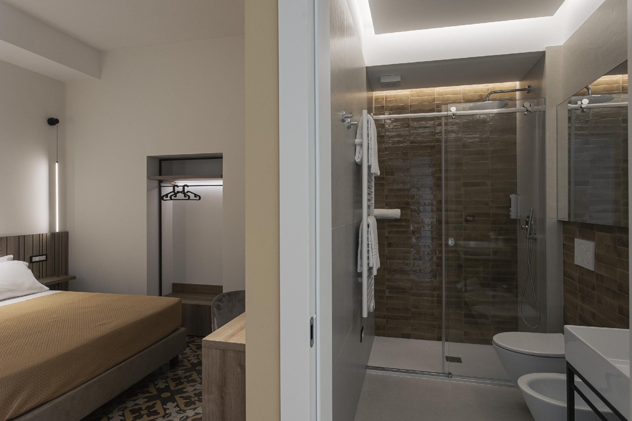 Dimora Don Minzoni Camera Tripla-Superiore-Bagno in camera-SUPERIOR 2