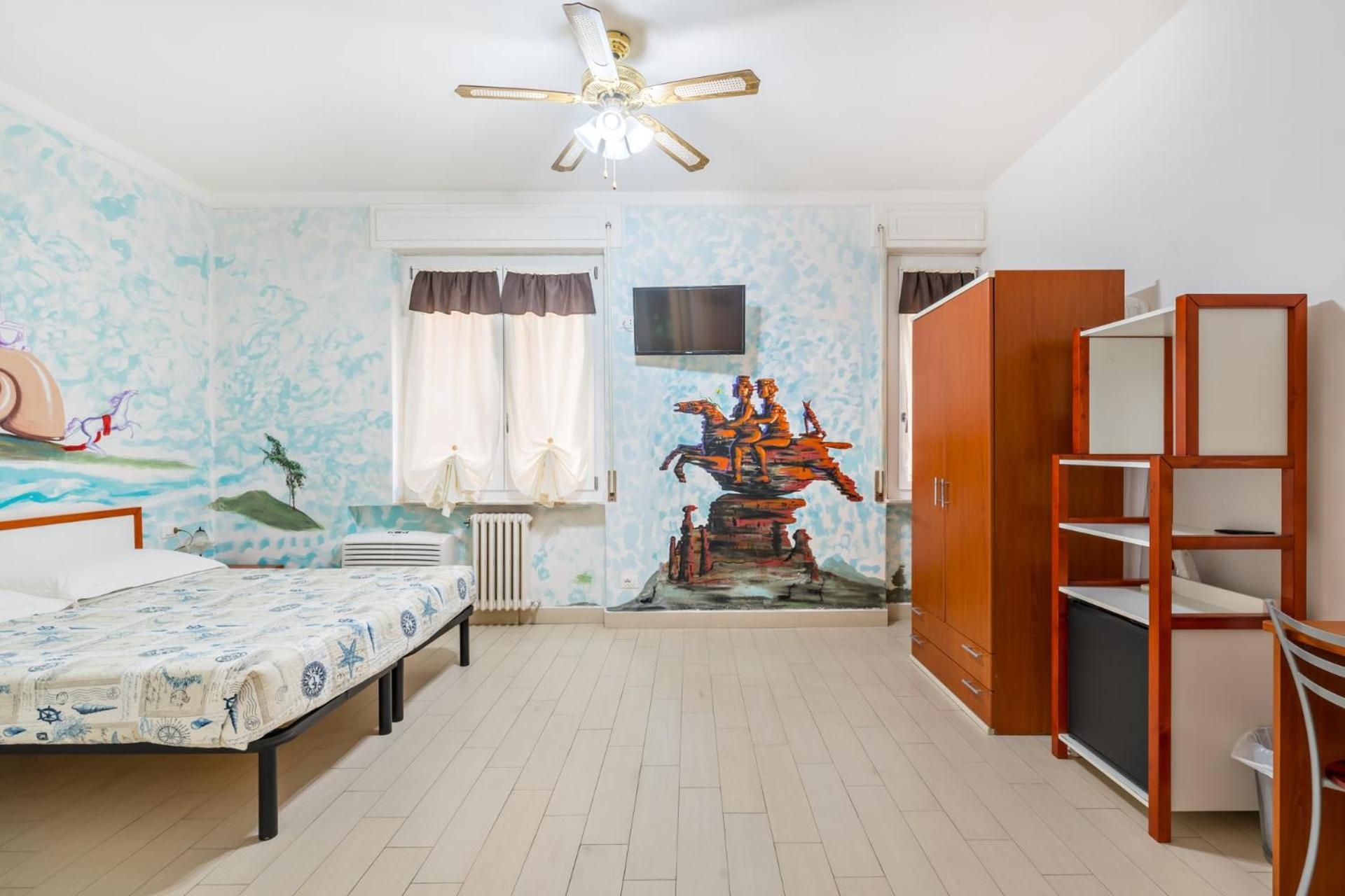 Quadruple Room with Private Bathroom