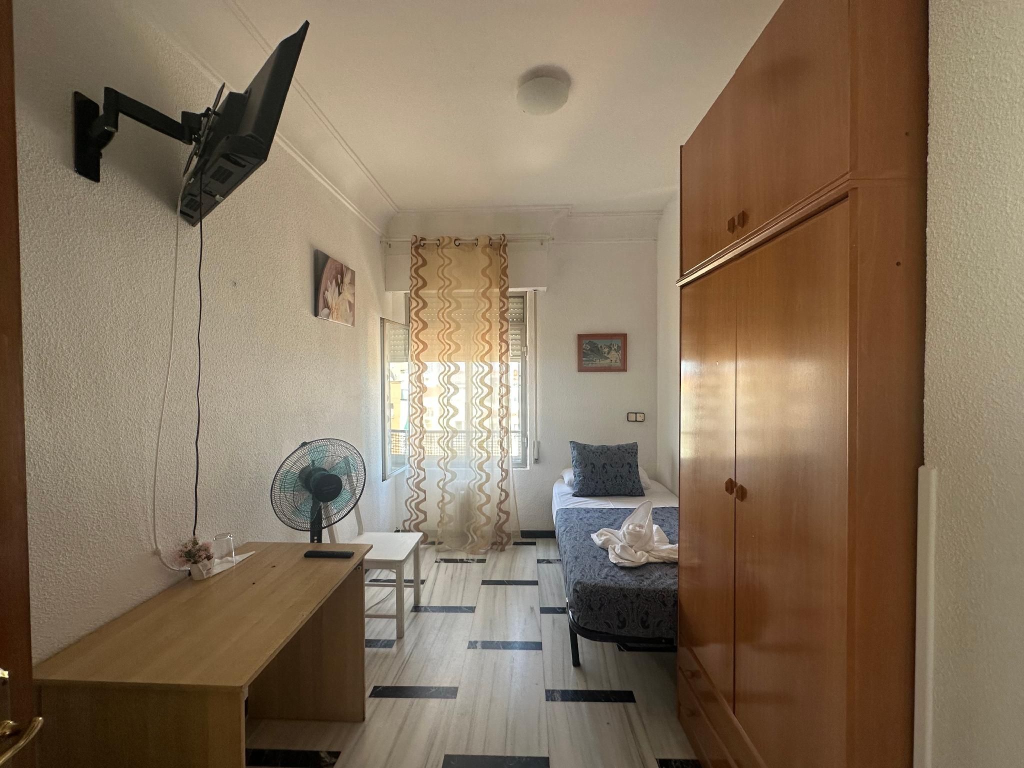 Single Room with Shared Bathroom