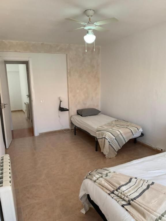 Triple Room with Shared Bathroom