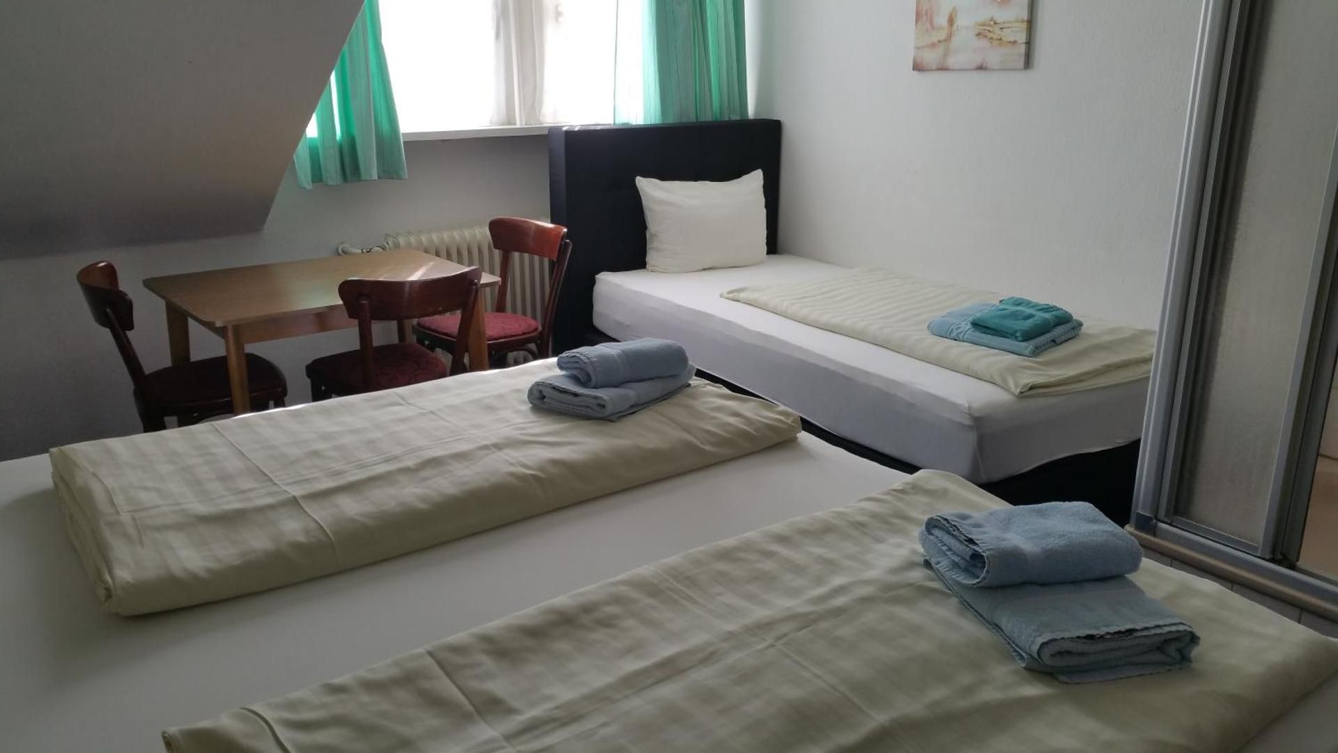 Triple Room with Shared Bathroom
