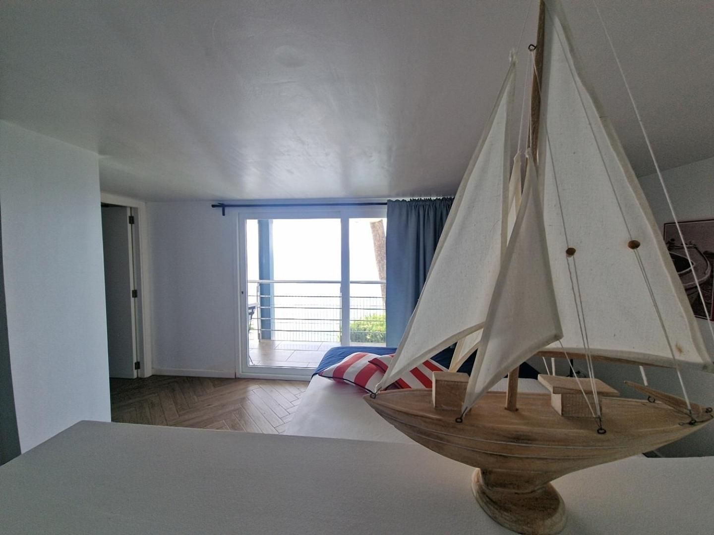 One-Bedroom Apartment with Balcony and Sea View