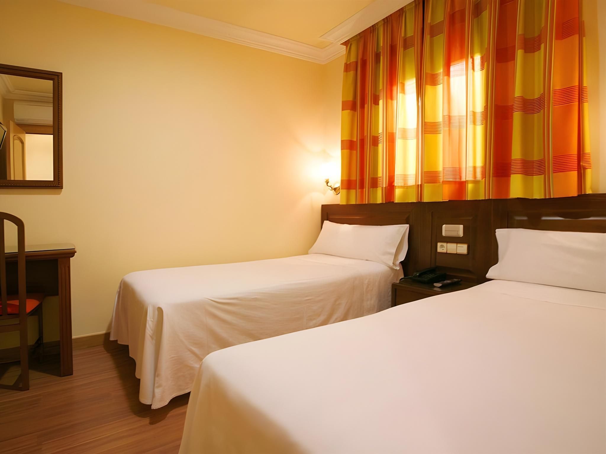 Triple - 3 Single Beds