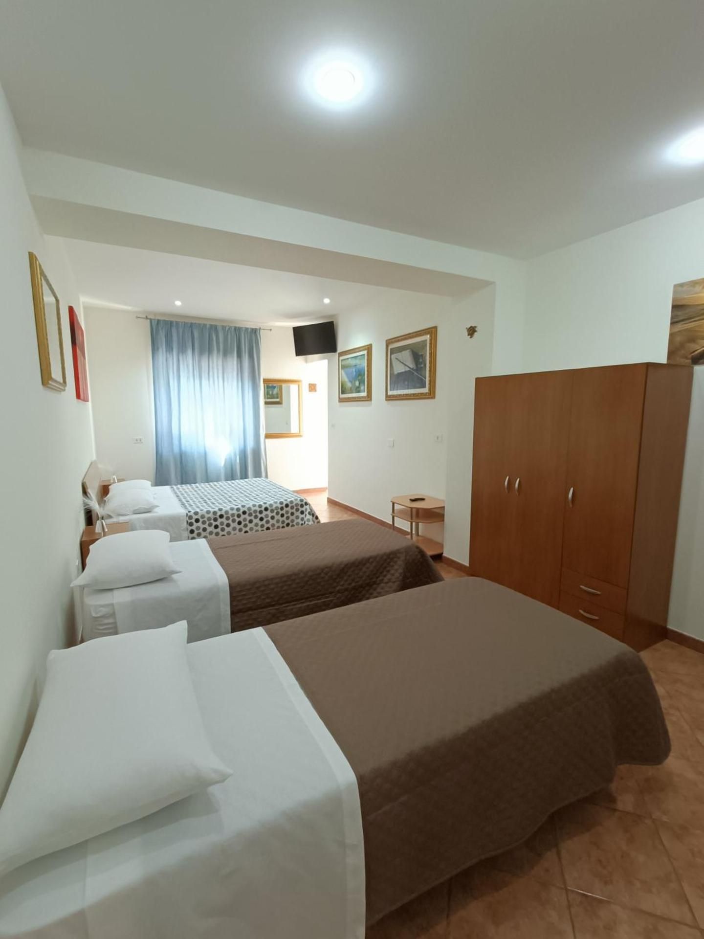 Quadruple Room with Private Bathroom