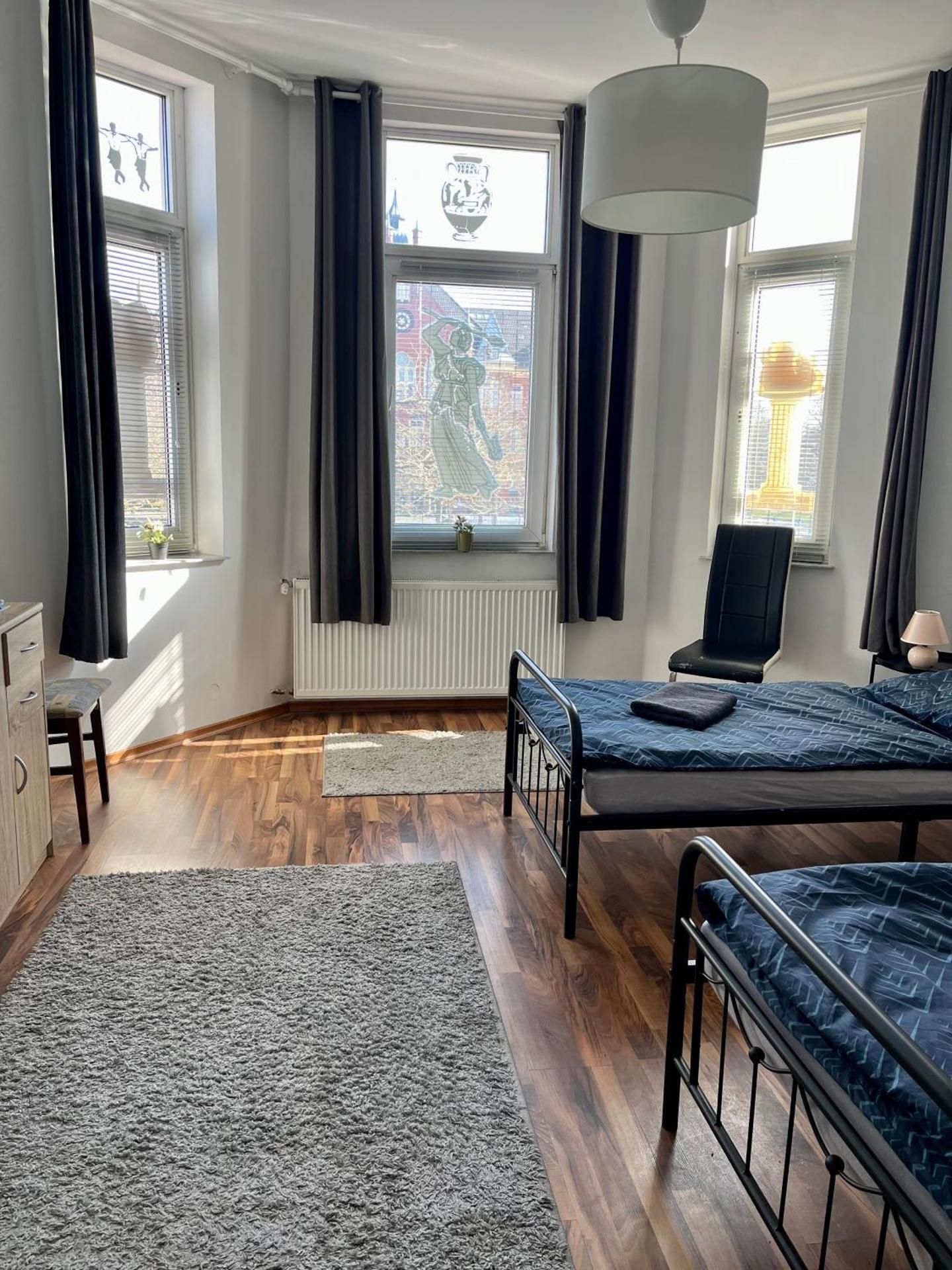 Four-Bedroom Apartment with Balcony 