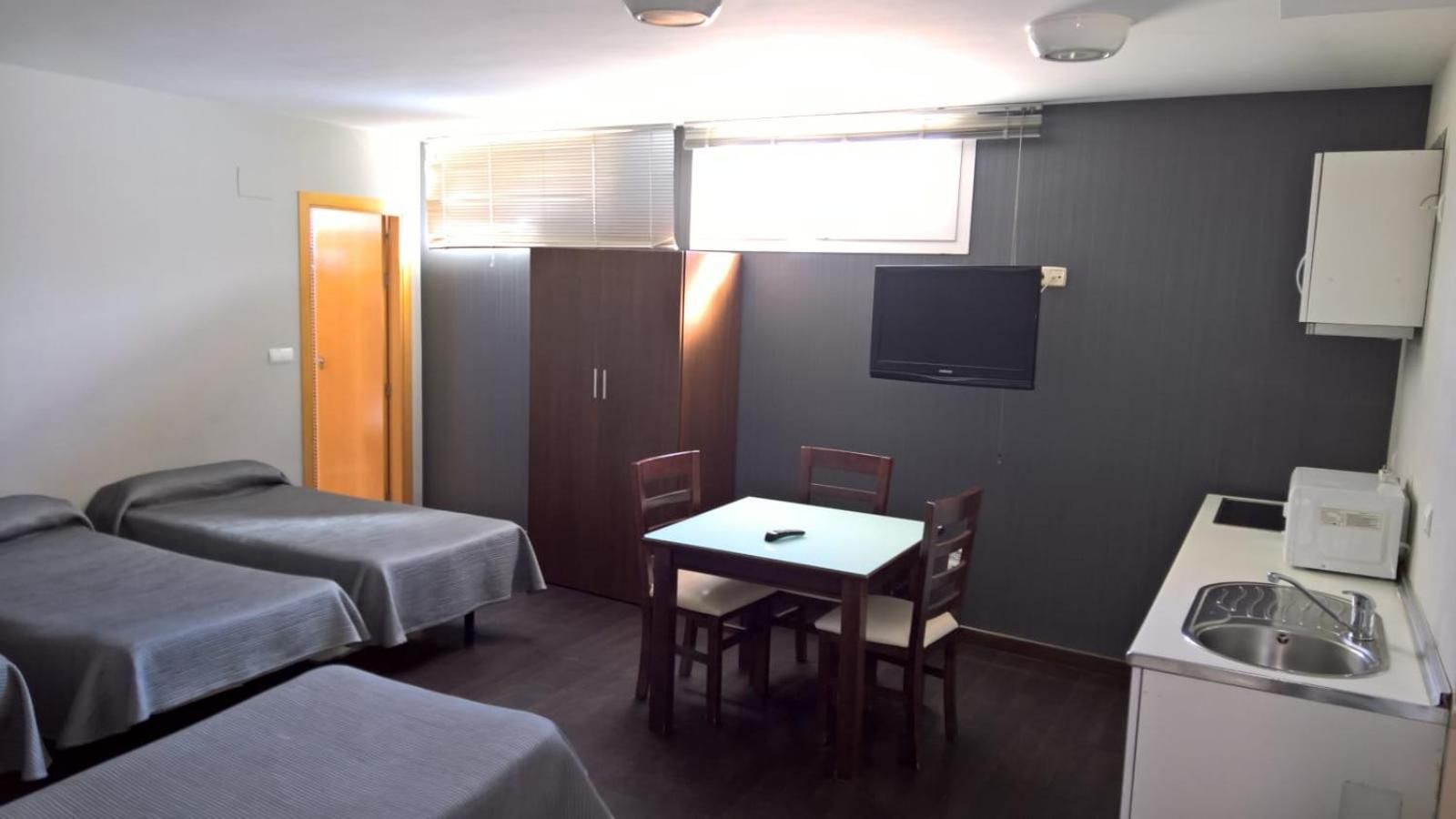 Apartamento SEMI-BAJO 4 camas individuales