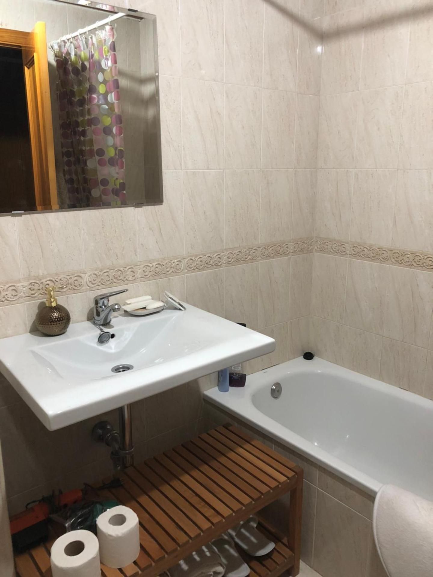 Three-Bedroom Apartment with Balcony