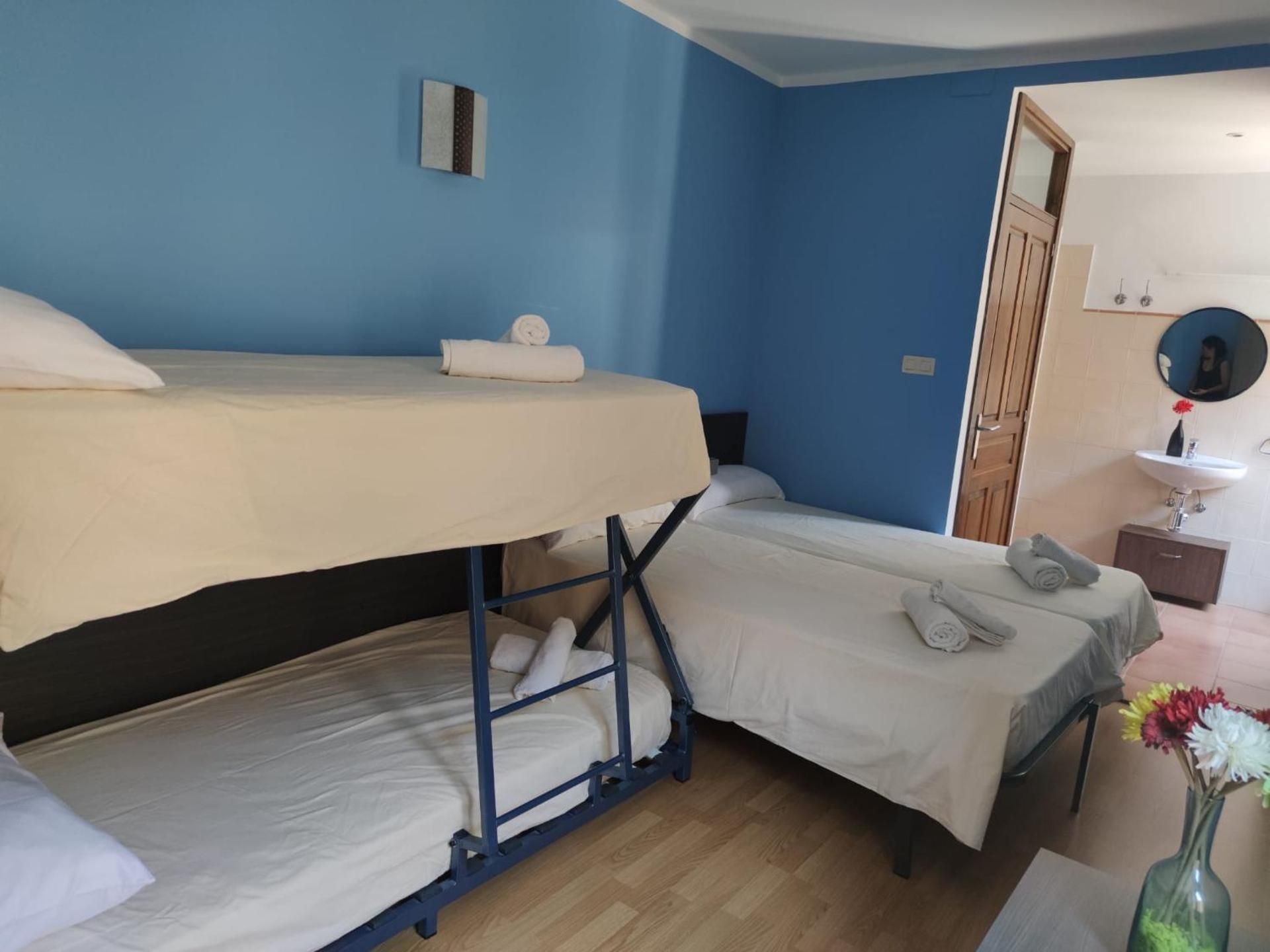 Quadruple Room with Private Bathroom