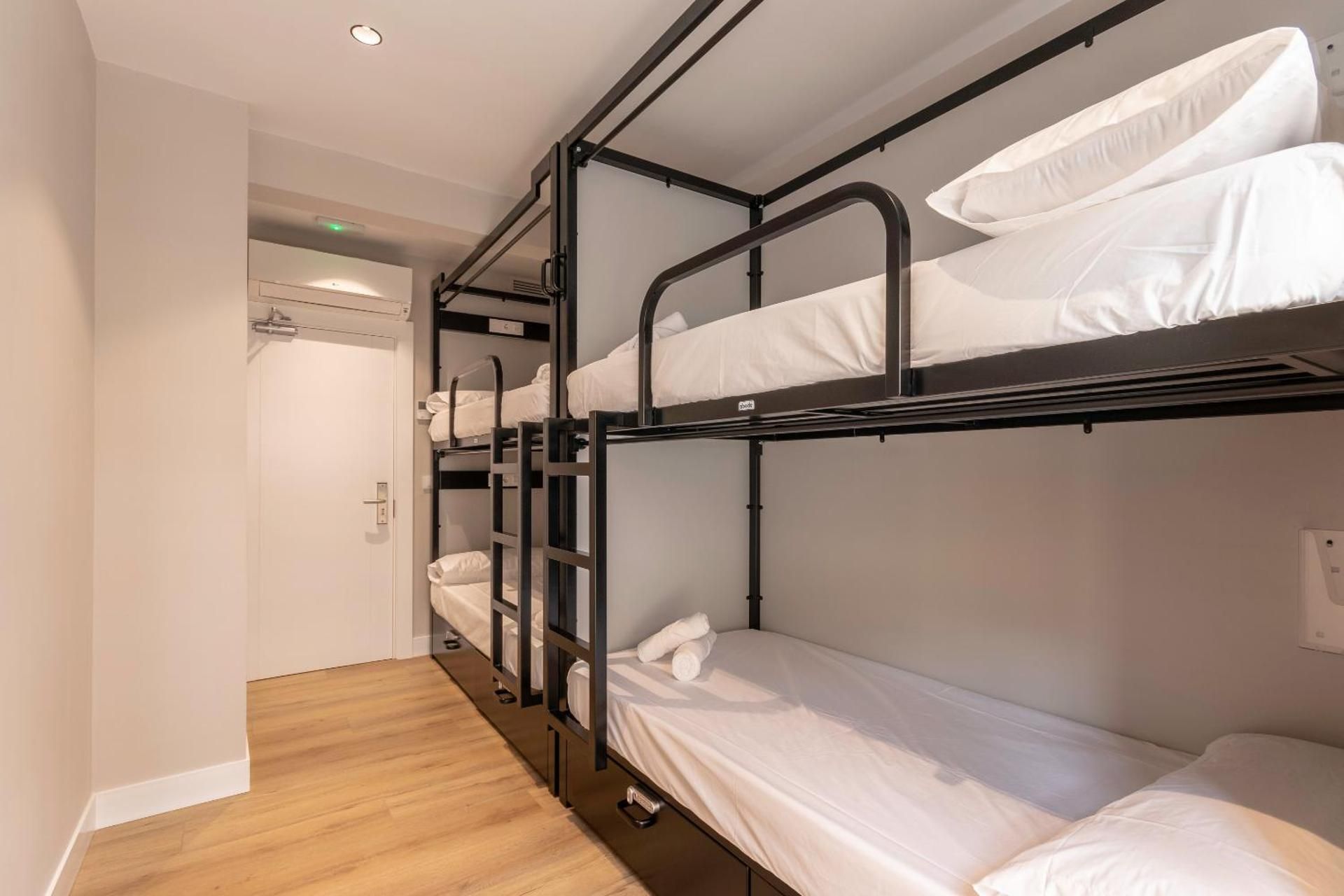 Top Bunk Bed in Male Dormitory Room