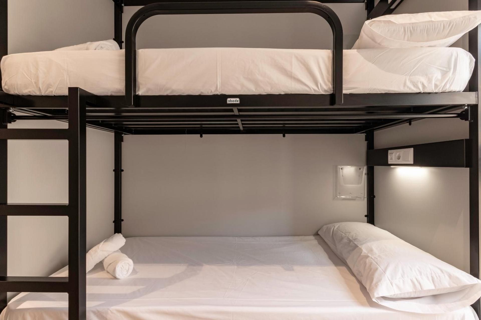 Top Bunk Bed in Male Dormitory Room