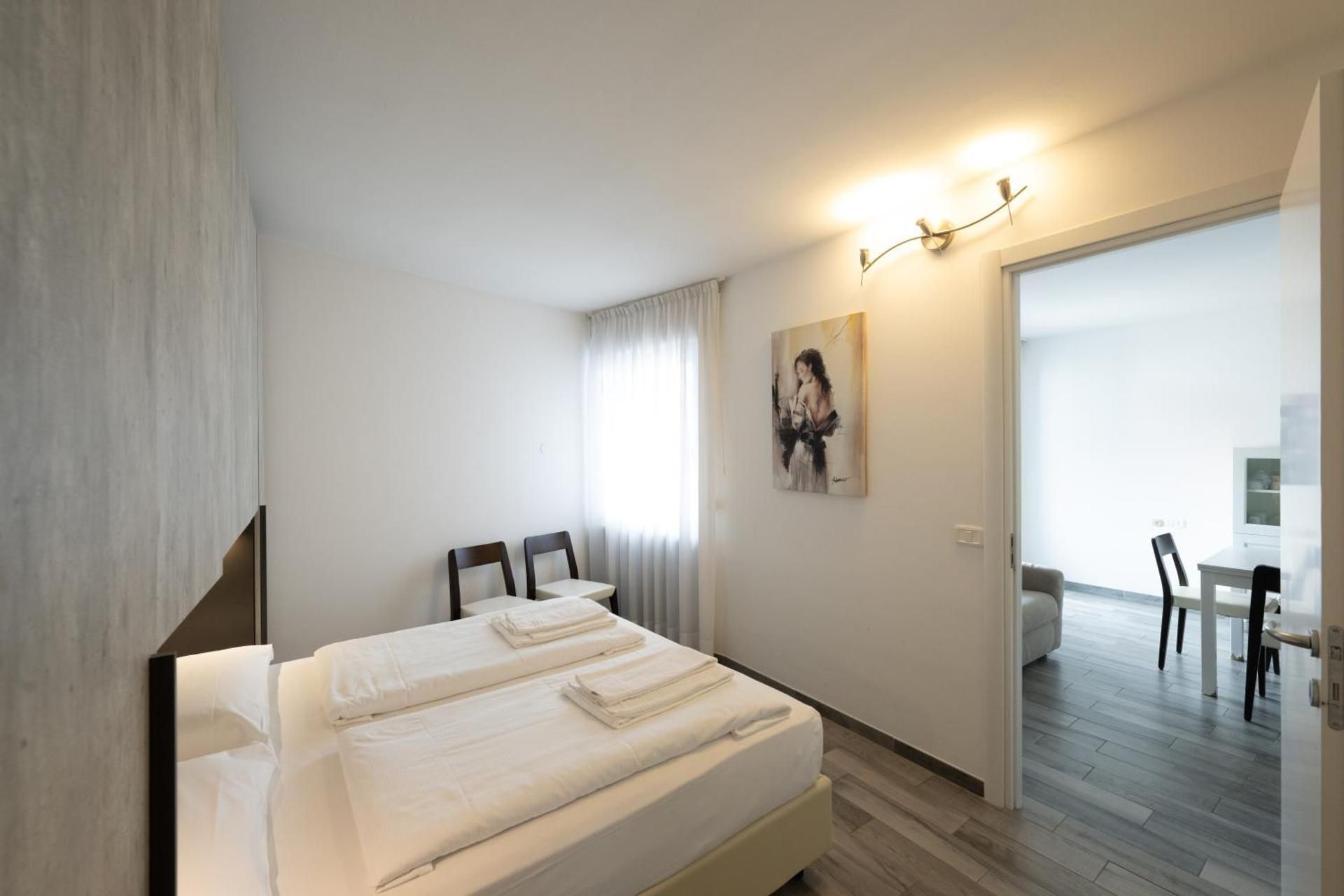 One-Bedroom Apartment with Balcony and Lake View