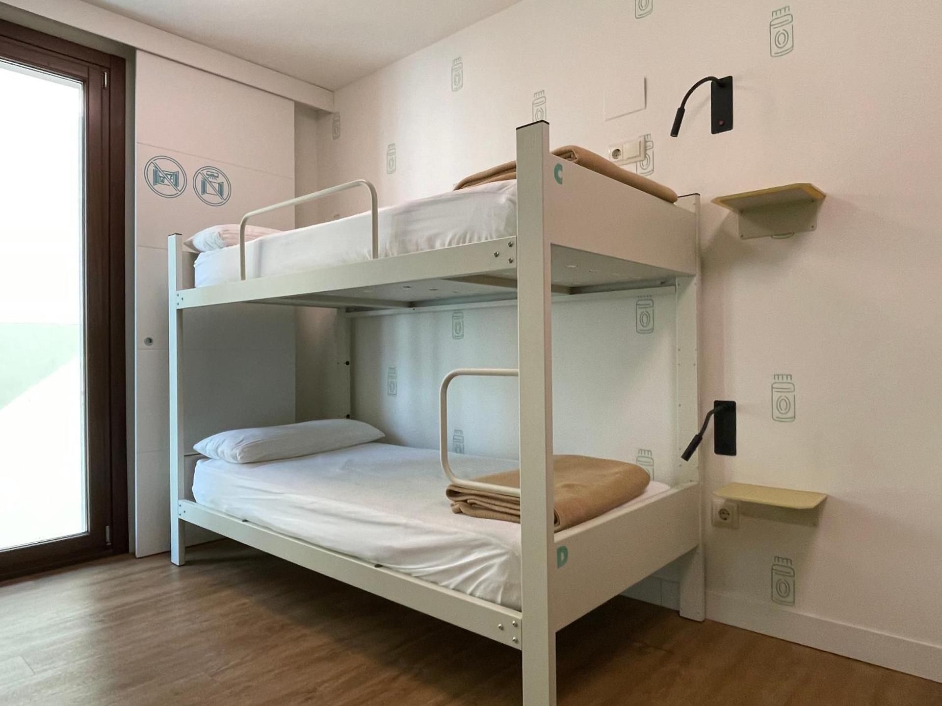Bed in 8-Bed Female Dormitory Room