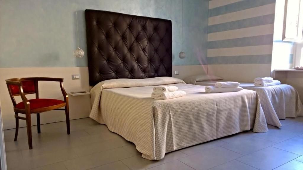 NIDO CENTER IV Deluxe Triple Room