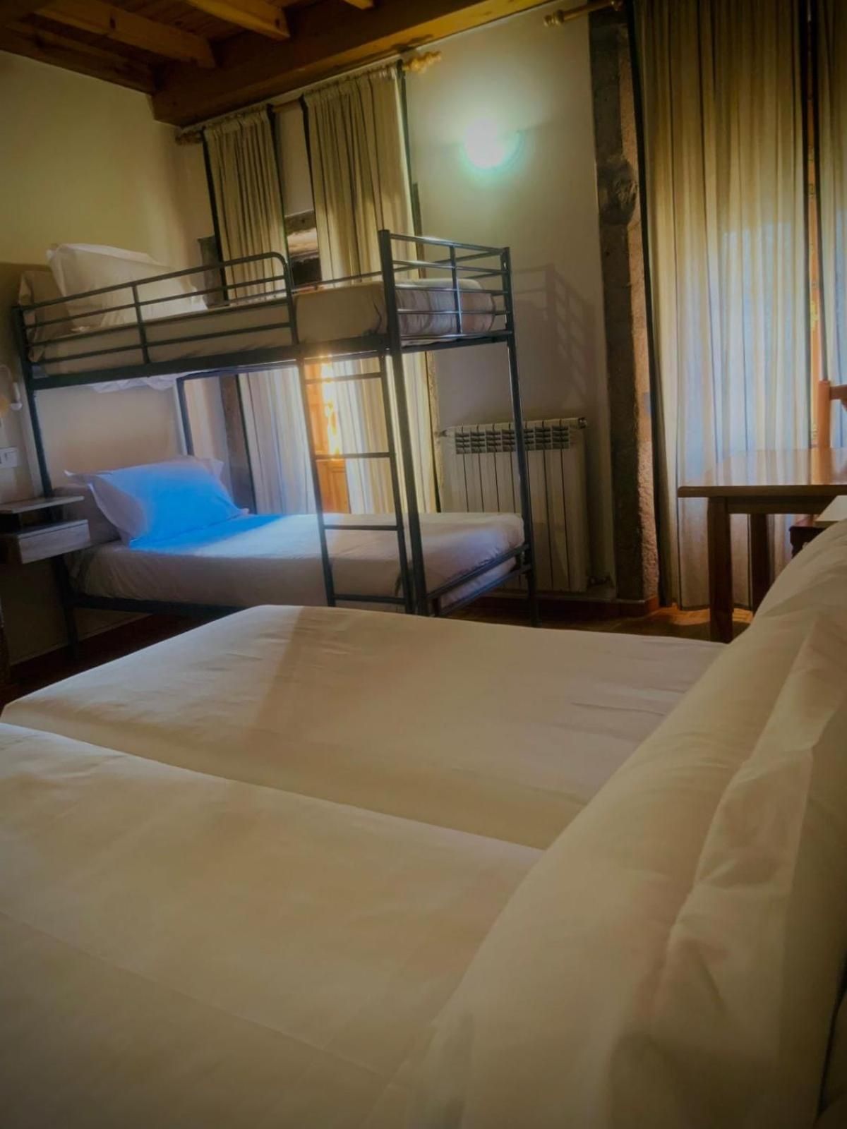Quadruple Room with Private Bathroom