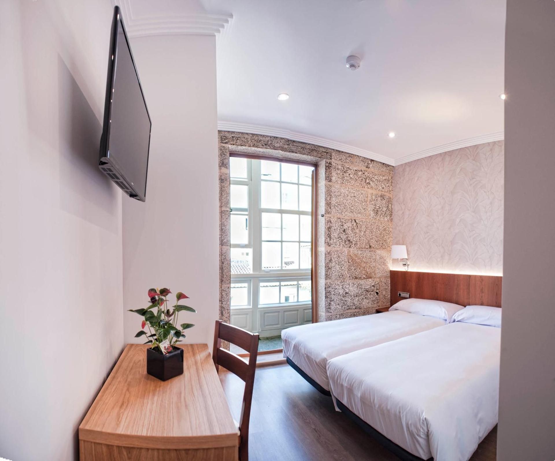 Pension O Codice by Moradas Nieto Twin Room