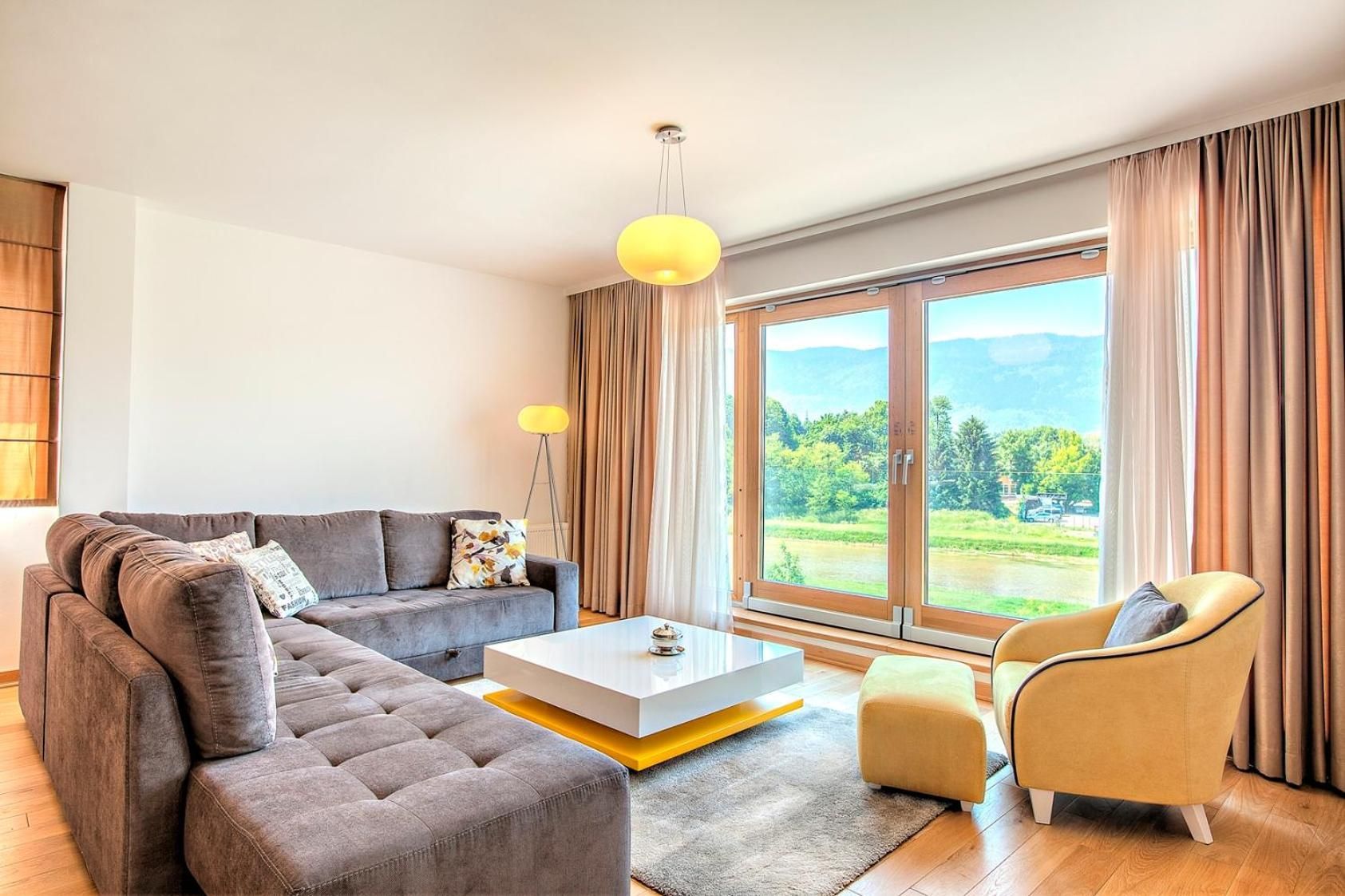 Three-Bedroom Apartment with Mountain and River View