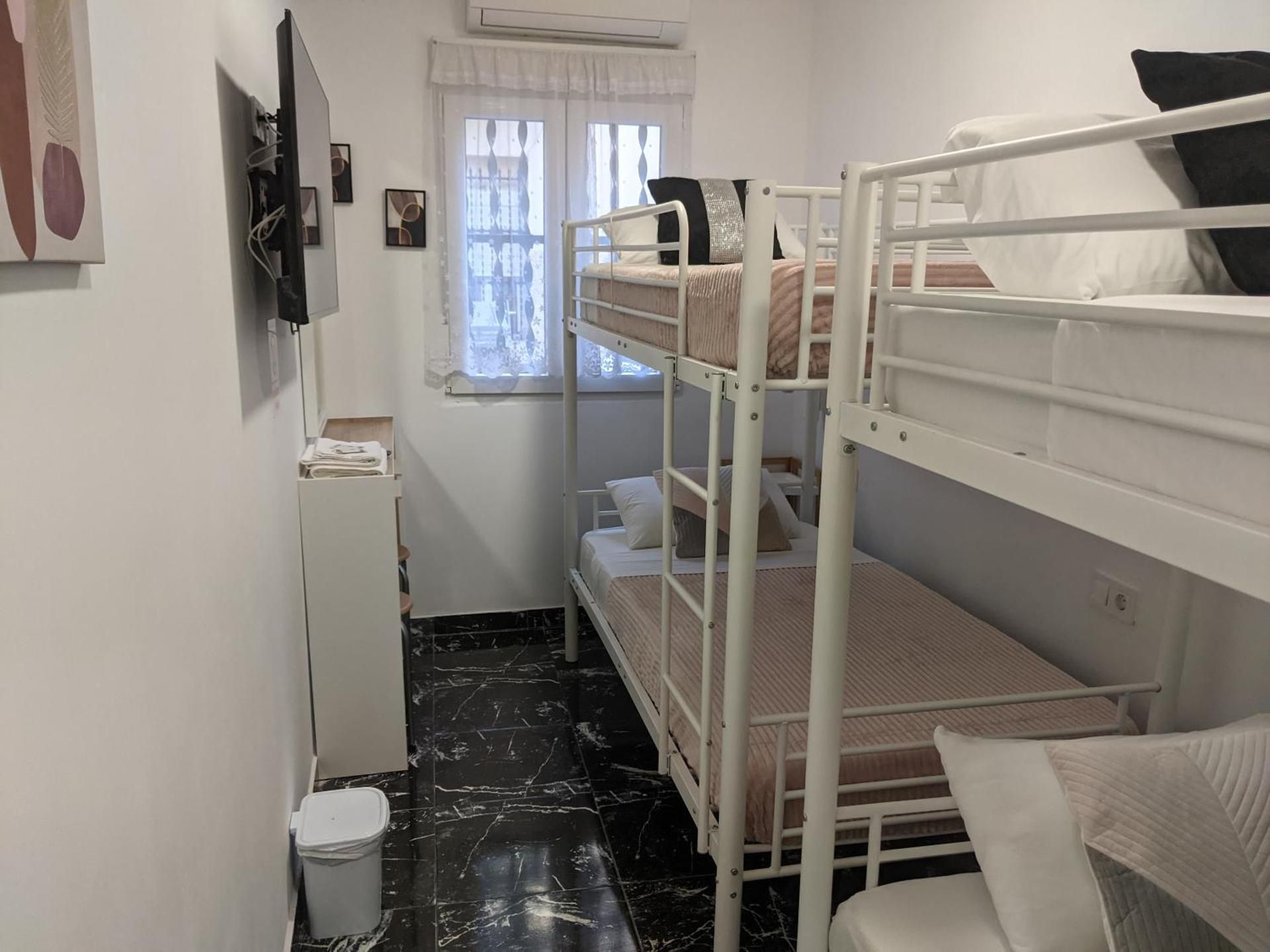 Quadruple Room with Shared Bathroom