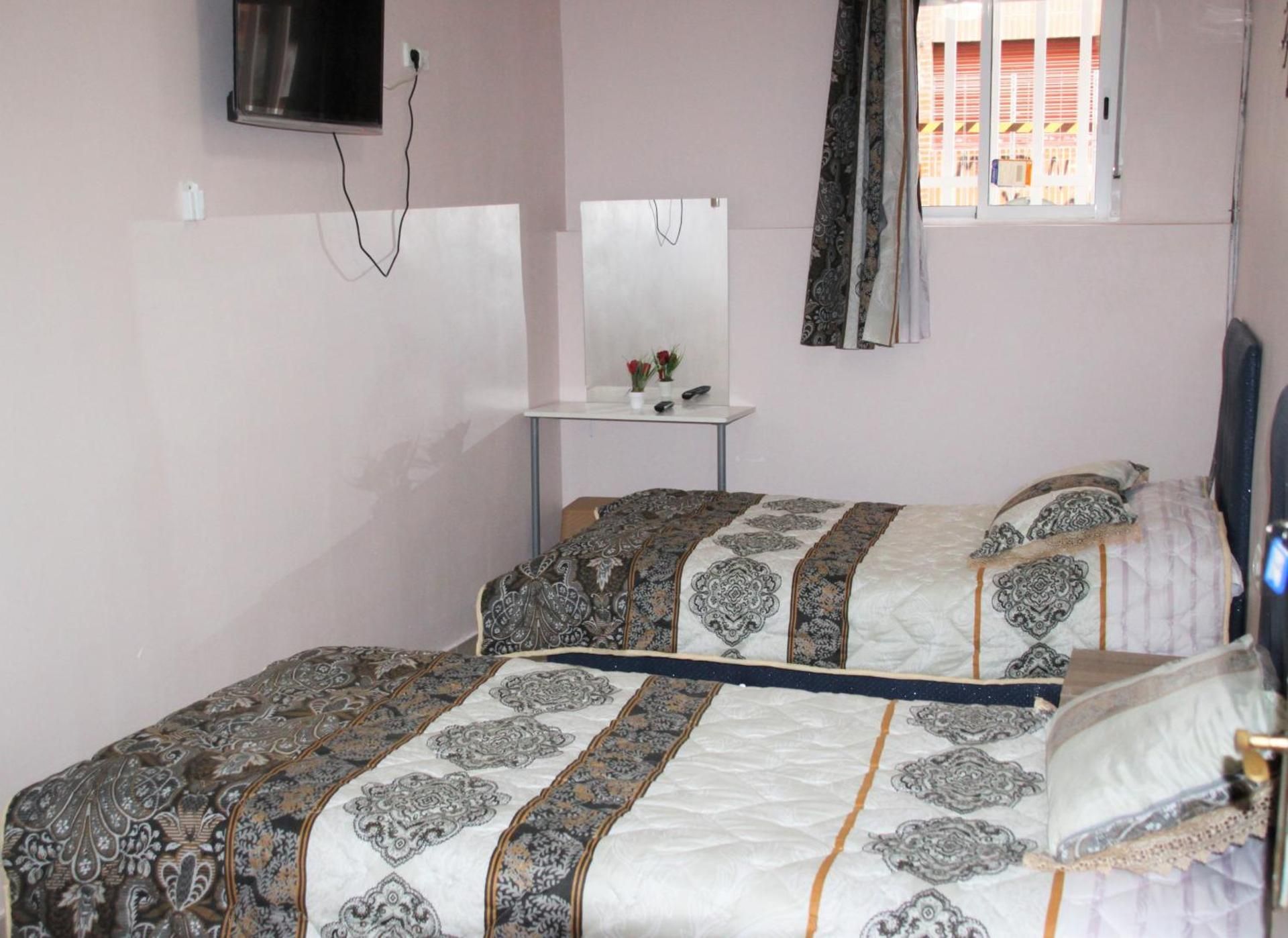 Standard Double Room with Shared Bathroom