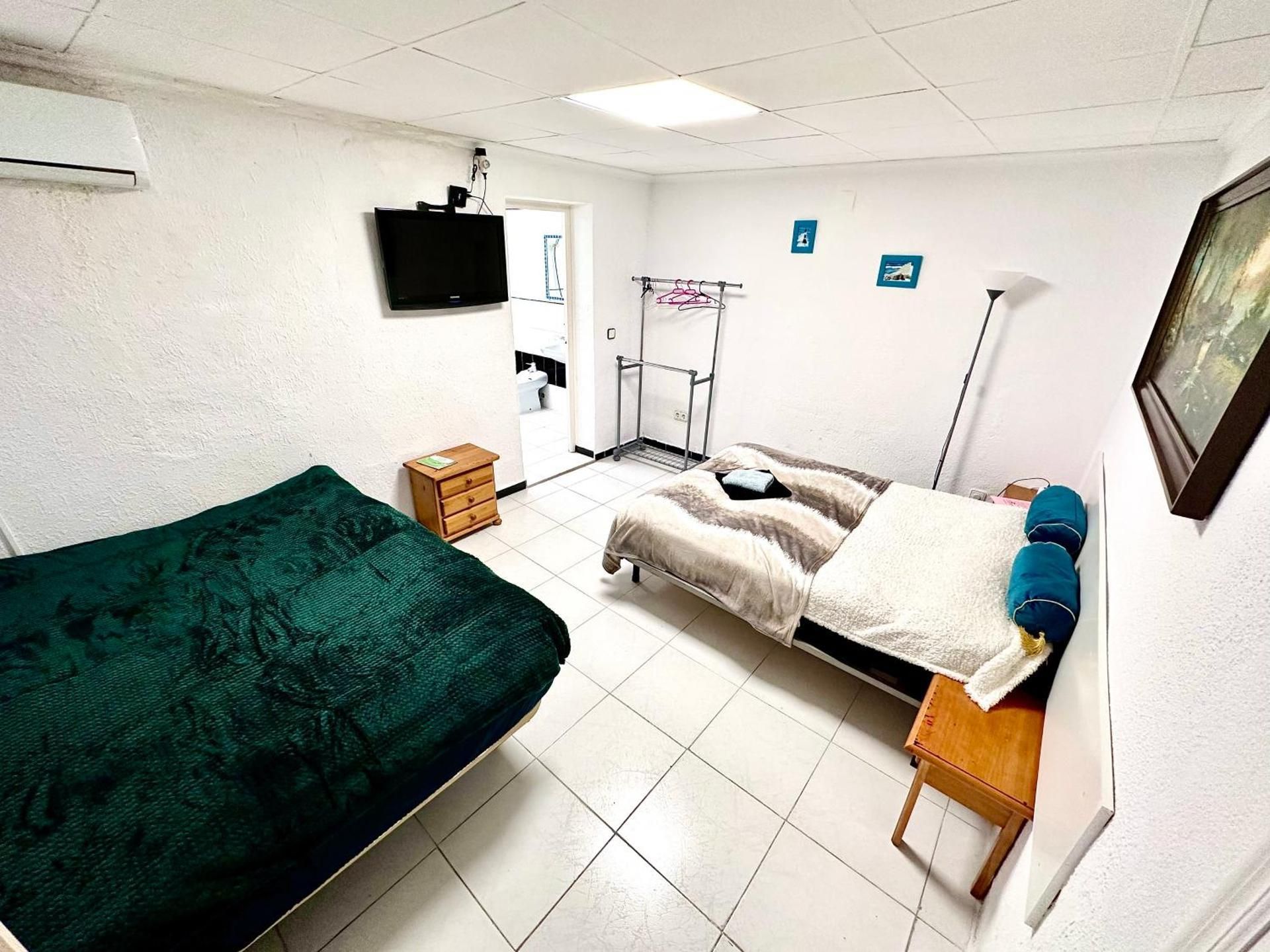 Quadruple Room with Private Bathroom