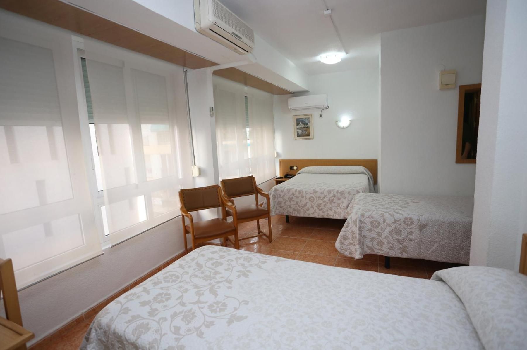 Triple Room (2 Adults + 1 Child)