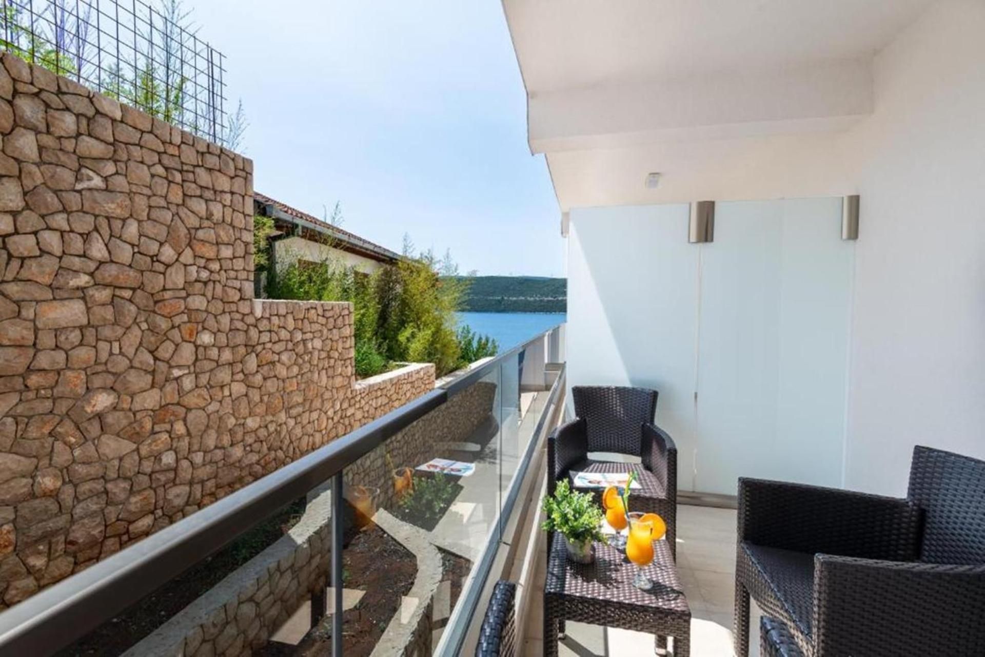 Standard Triple Room with Balcony and Side Sea View