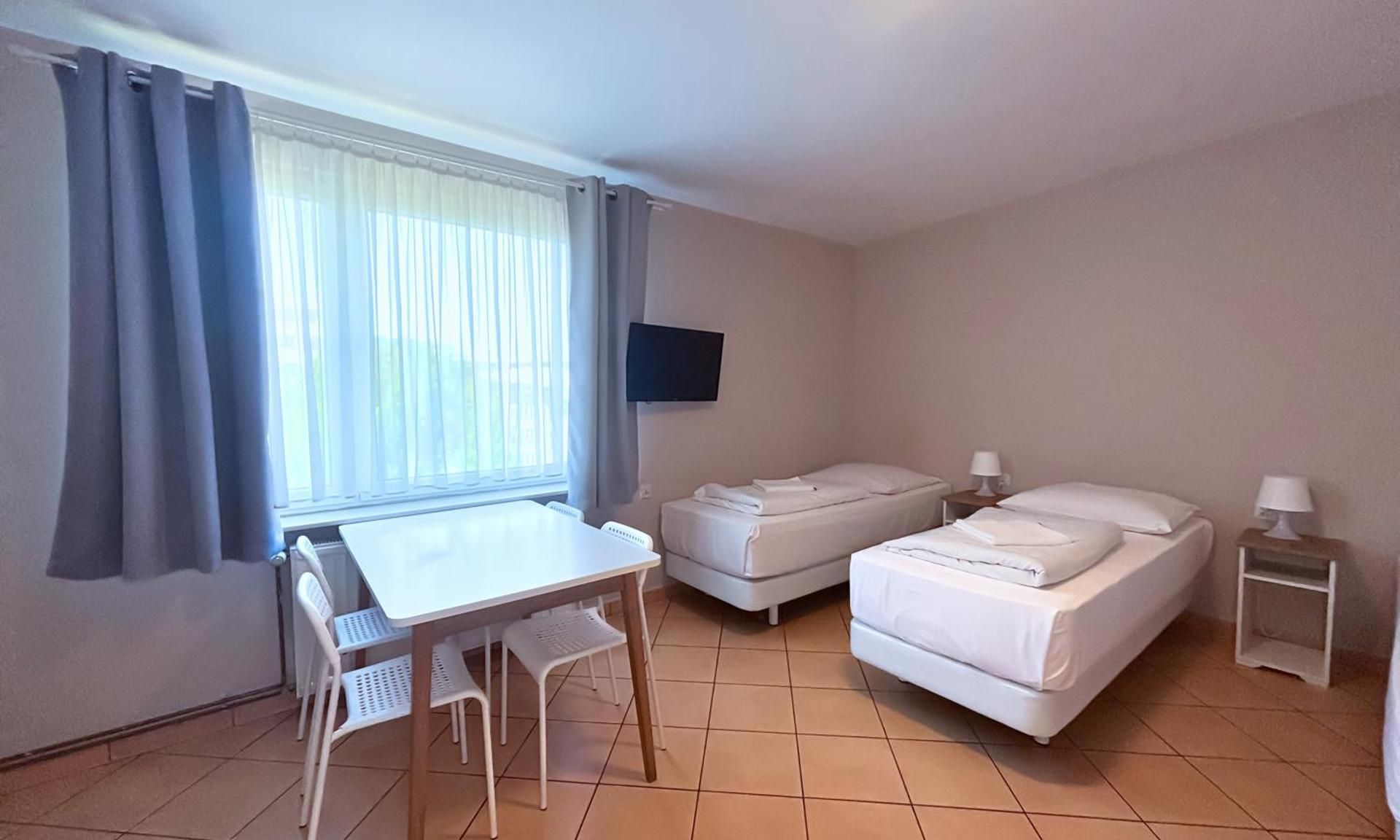 Quadruple Room with Shared Bathroom