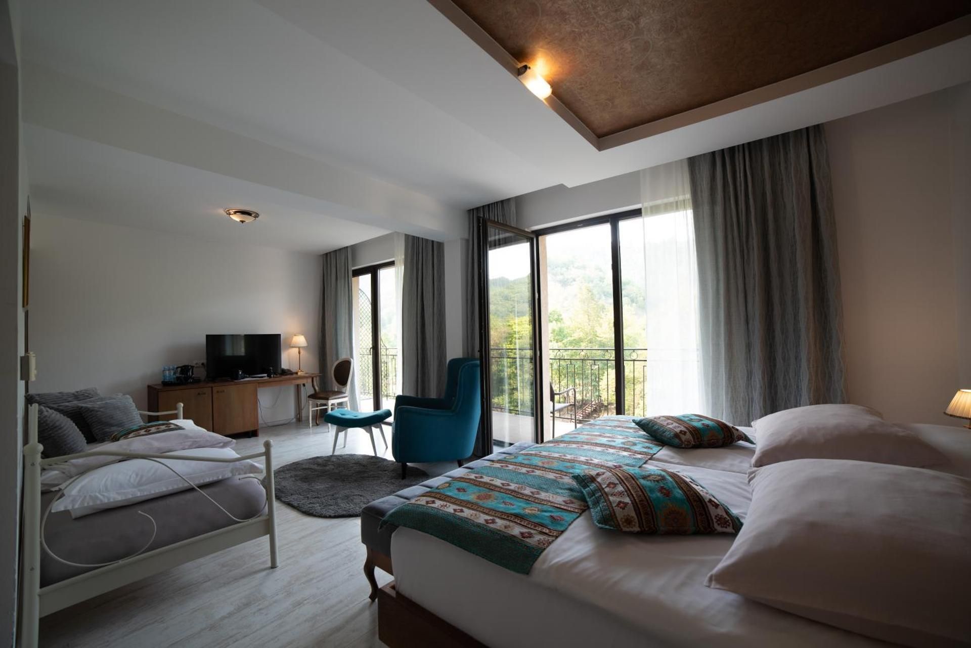 Superior Triple Room with River View and Balcony