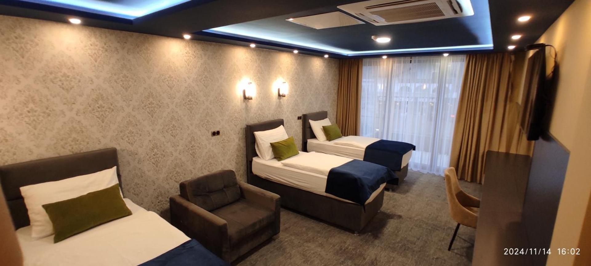 Deluxe Triple Room