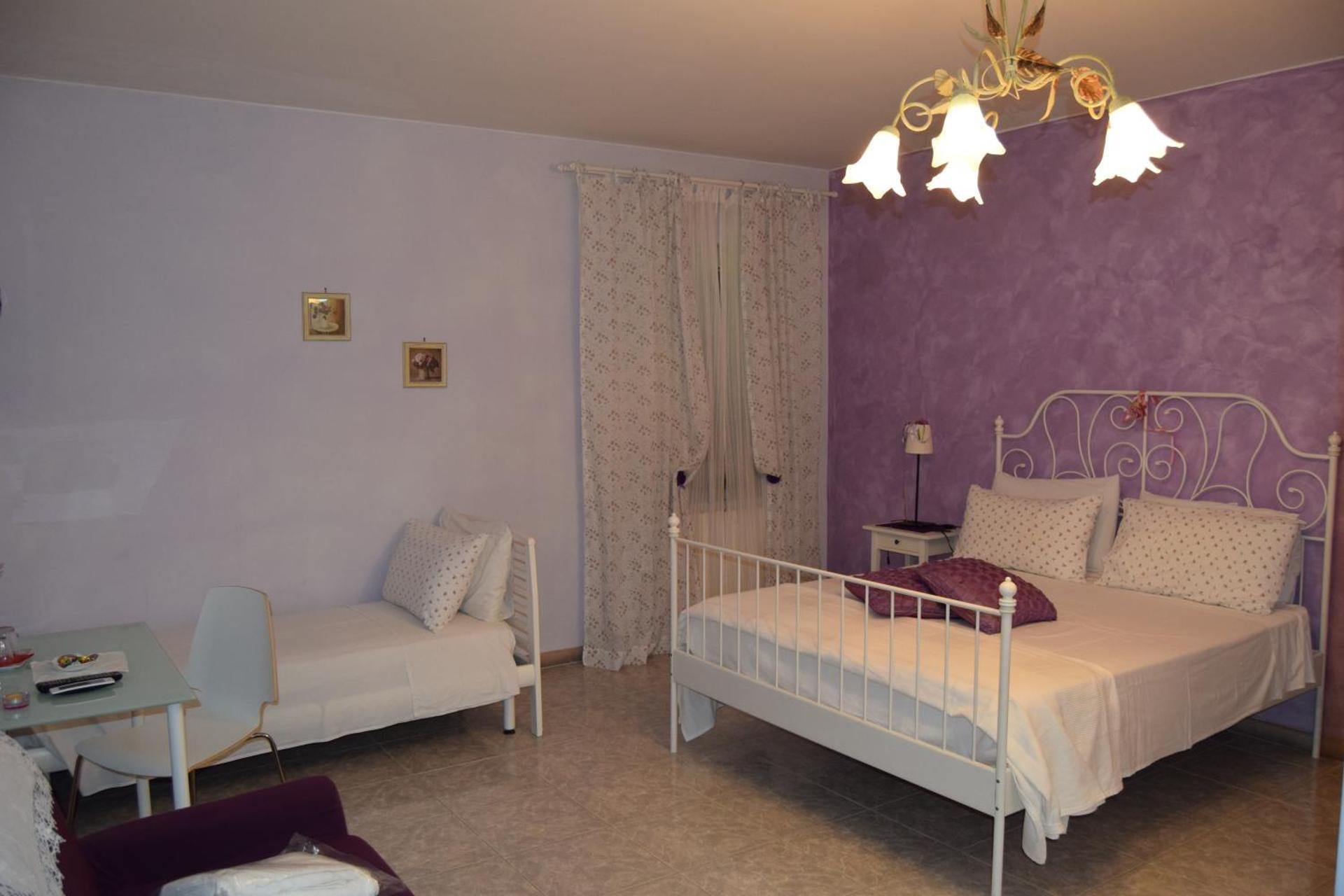 Quadruple Room with Private Bathroom