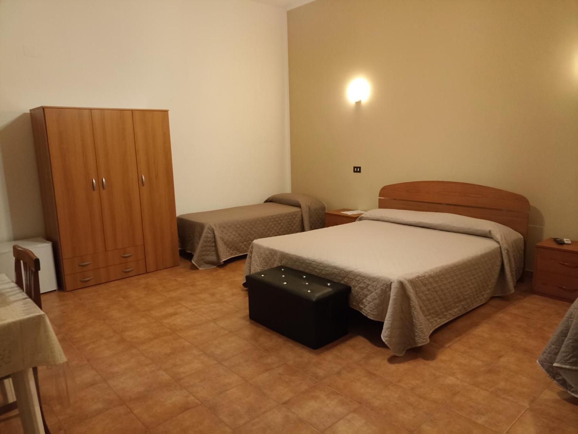 Quadruple Room with Private Bathroom