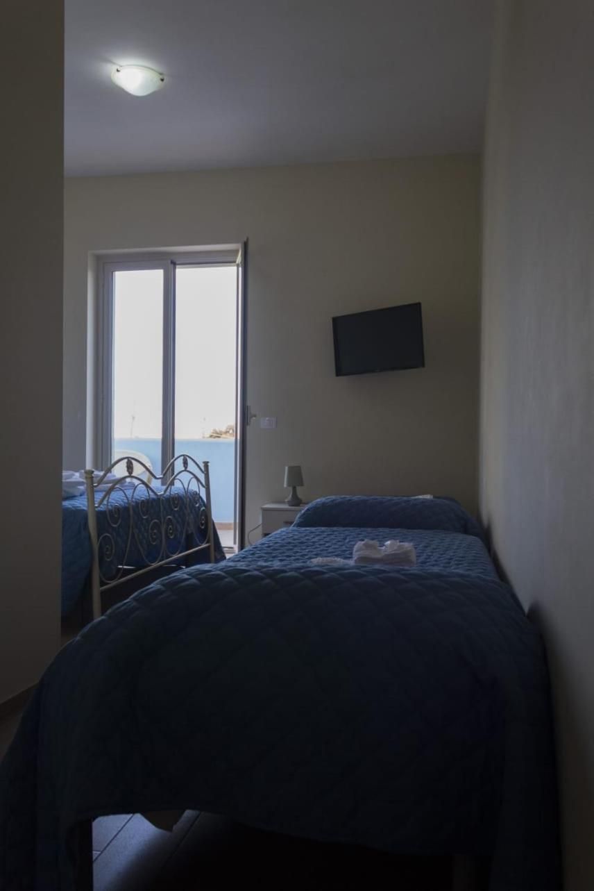 Quadruple Room with Private Bathroom