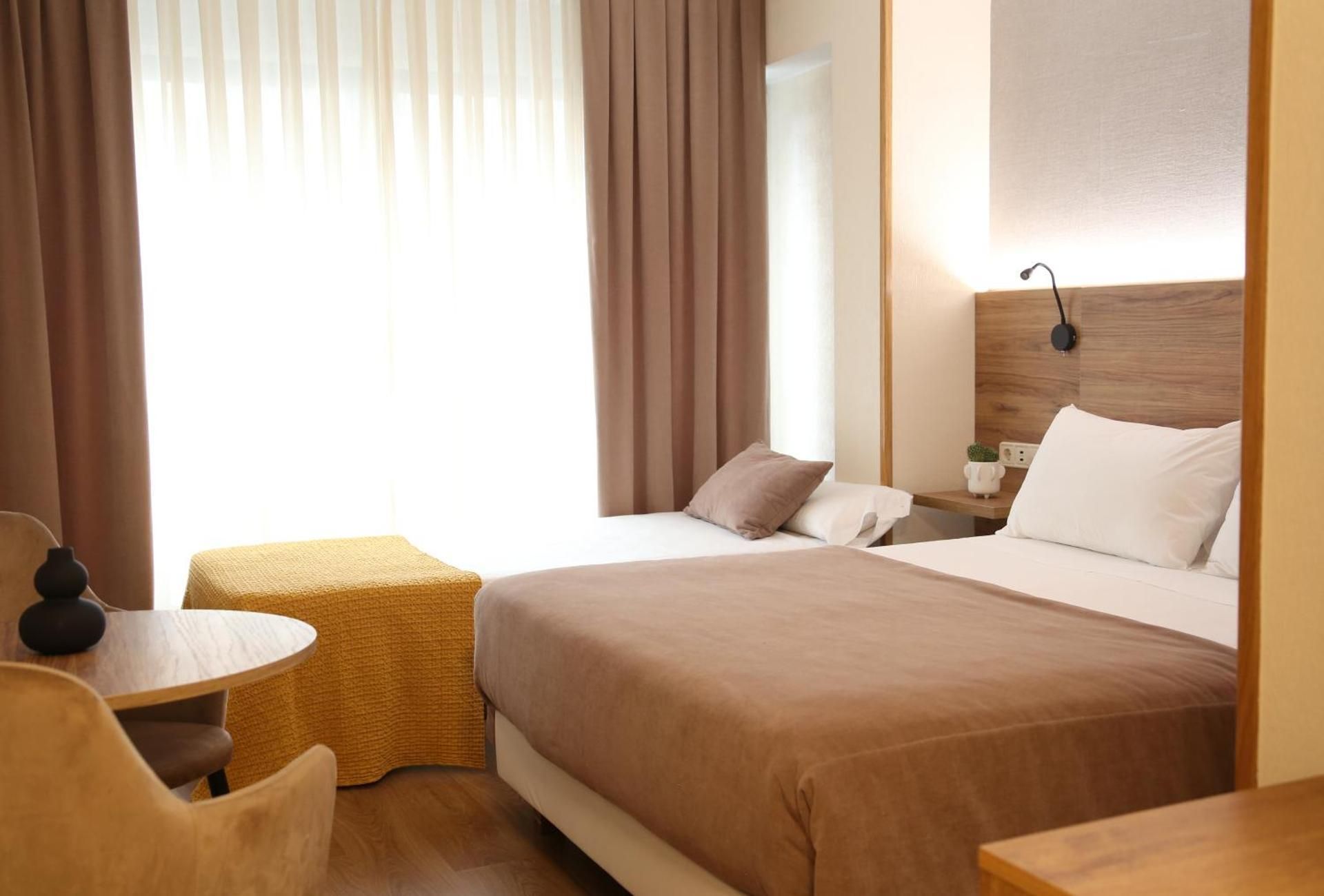 Double Room with Extra Bed (2 Adults + 1 Child)