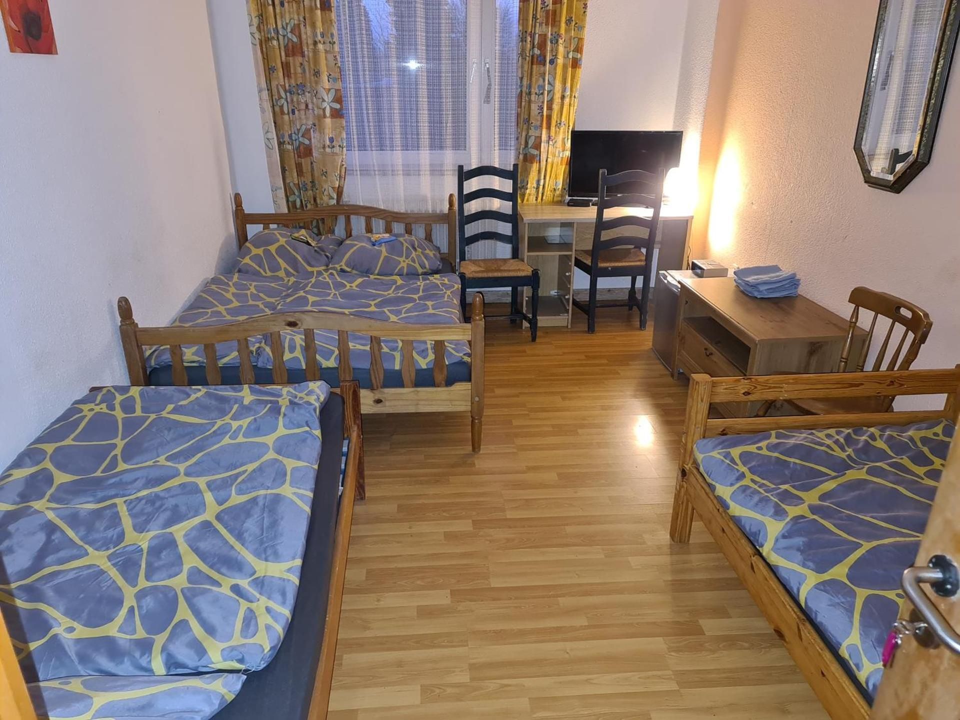 Quadruple Room with Shared Bathroom