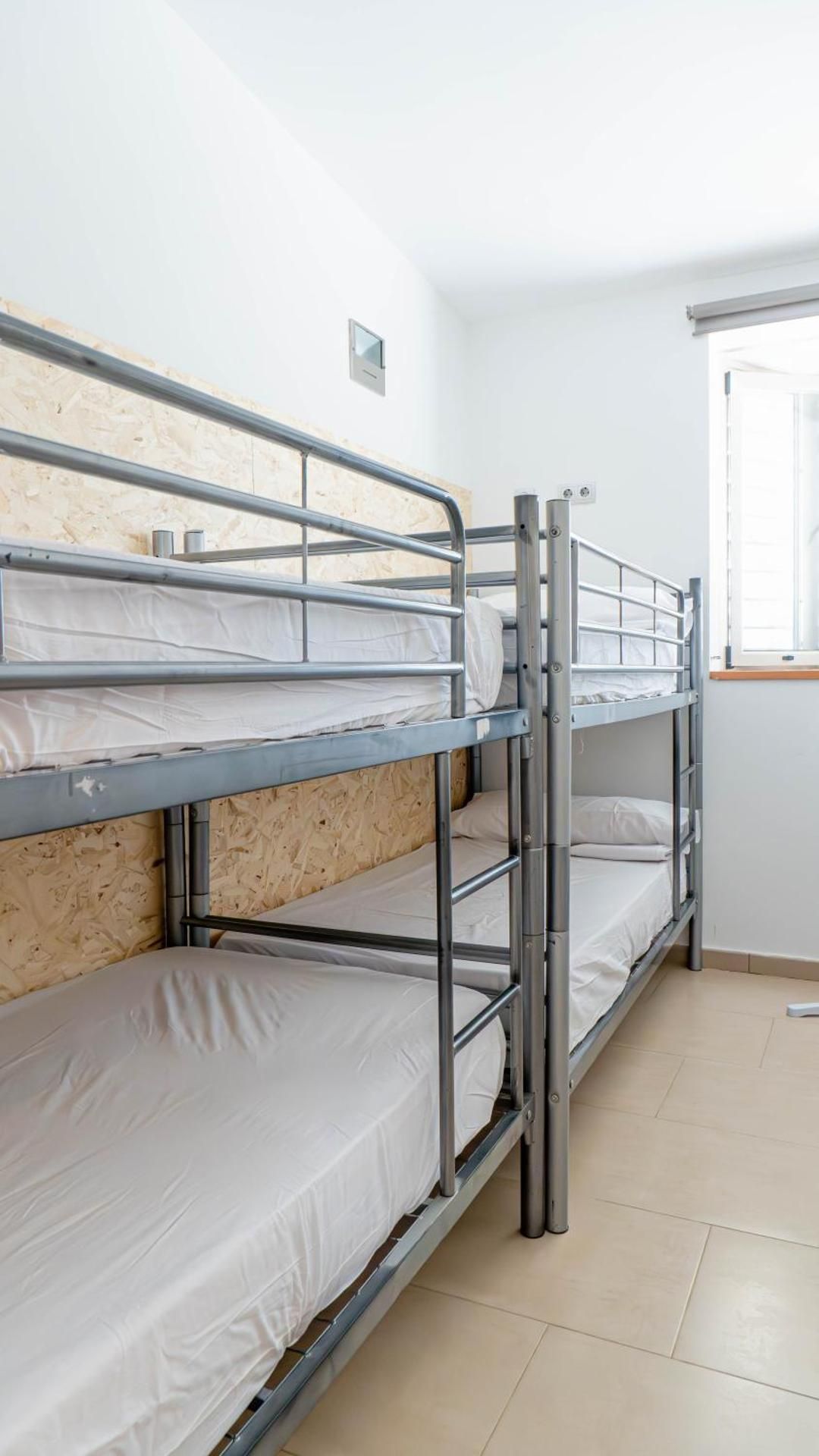 Single Bed in Female Dormitory Room