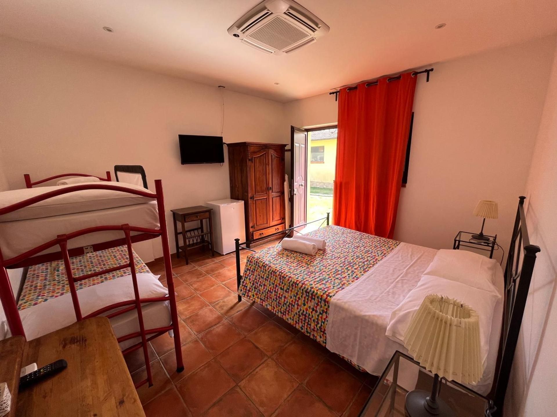 Quadruple Room with Private Bathroom
