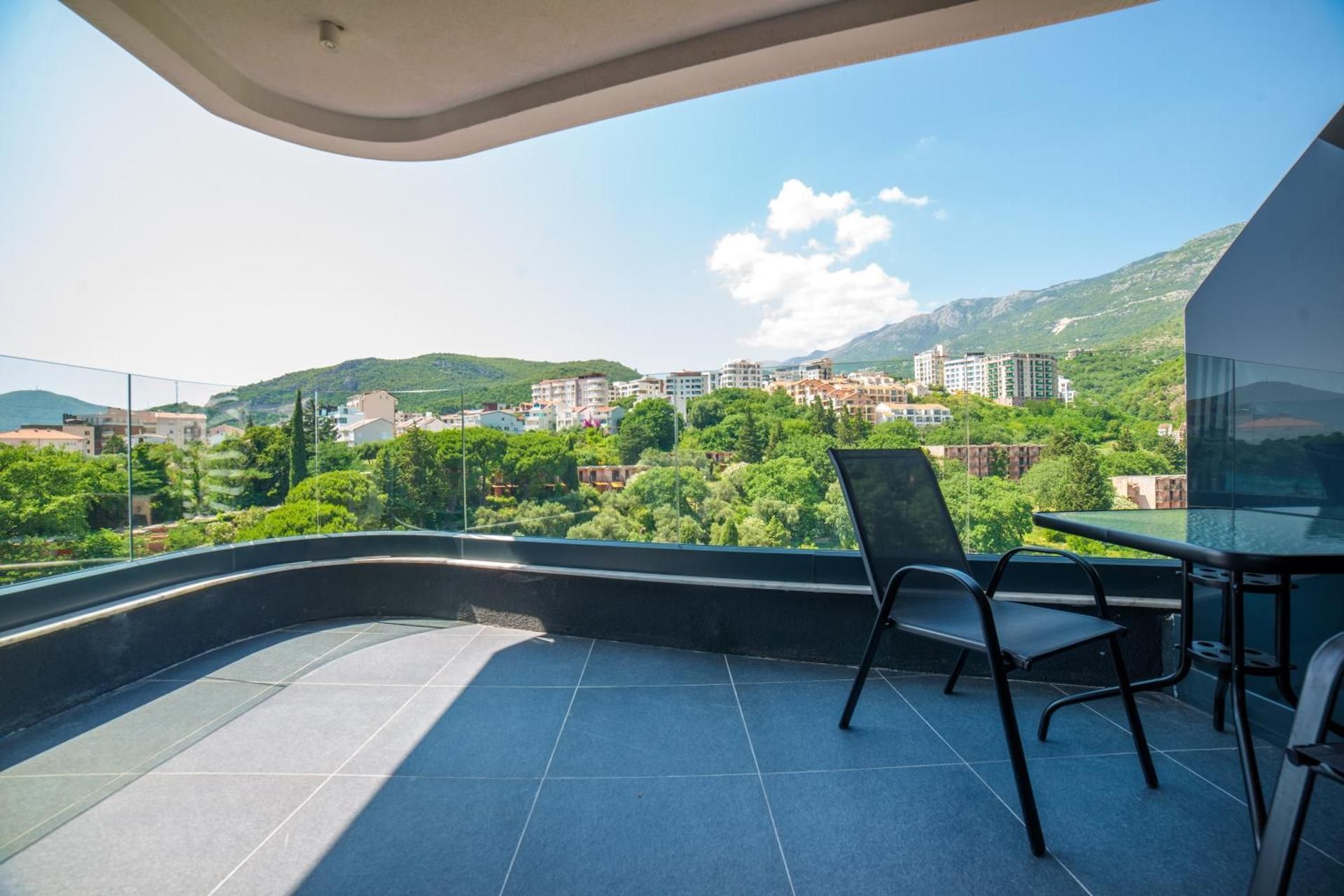 One-Bedroom Apartment with Balcony and Mountain View