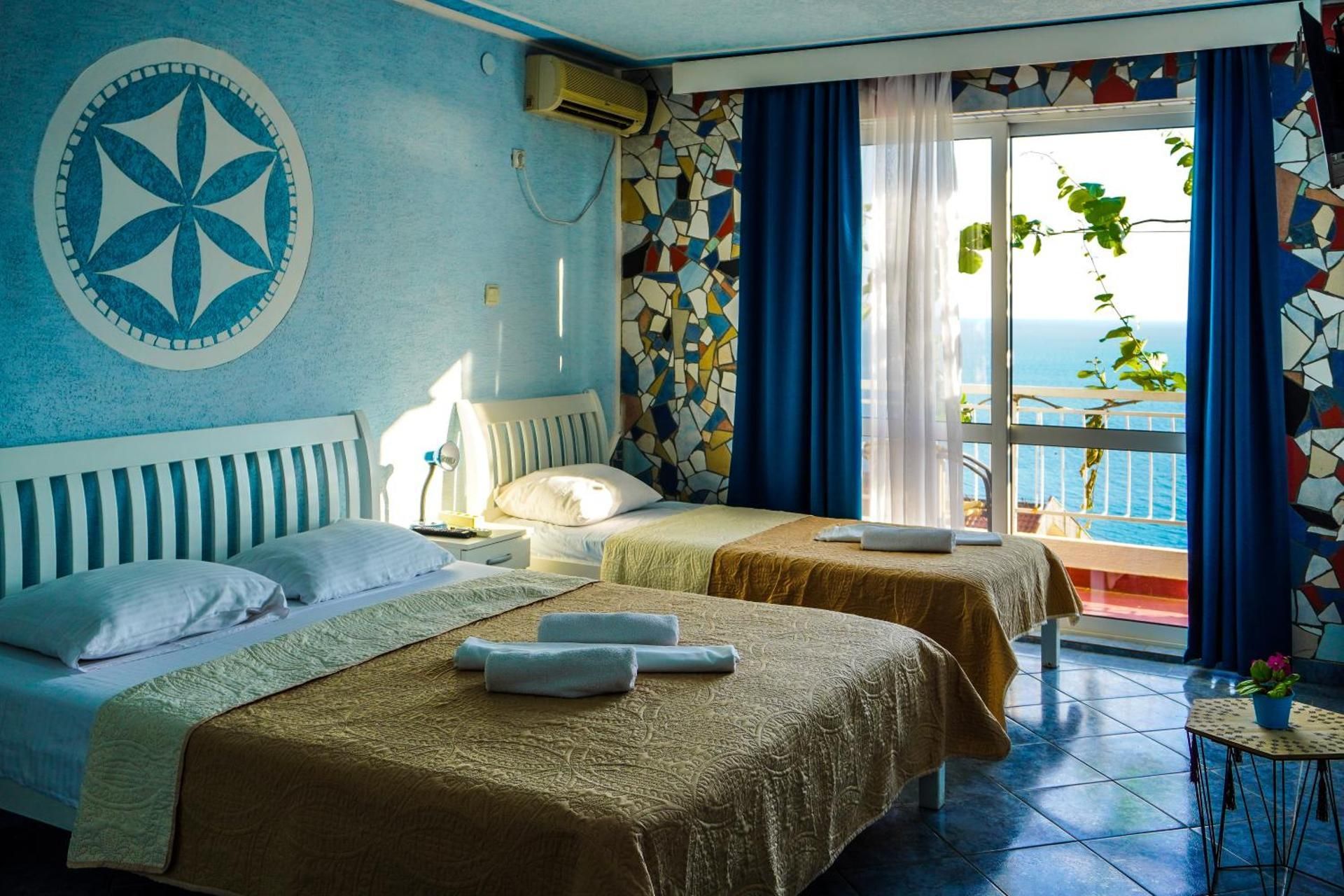 Sun Apartments Two-Bedroom Apartment with Balcony and Sea View