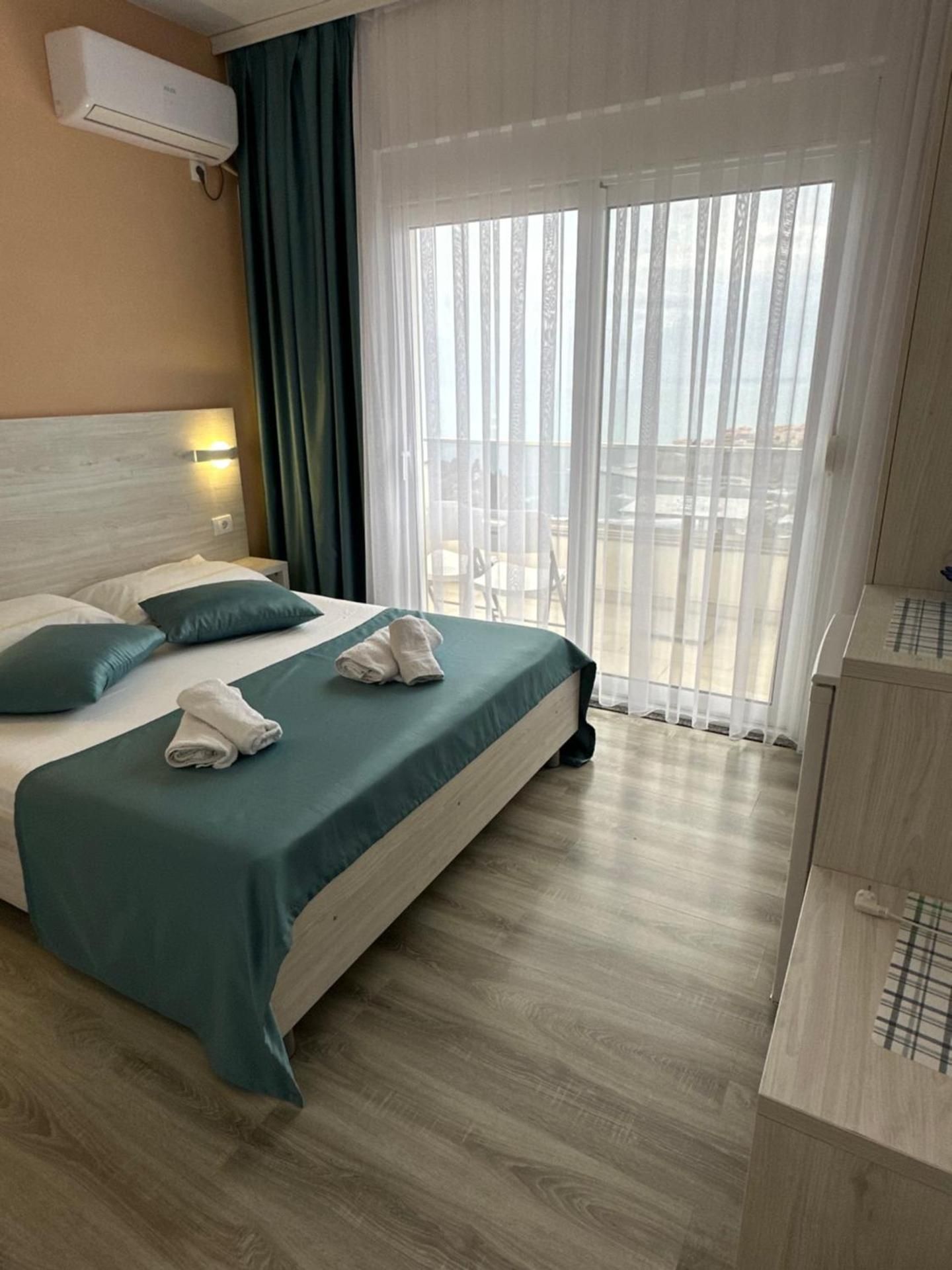 One-Bedroom Apartment with Balcony and Sea View