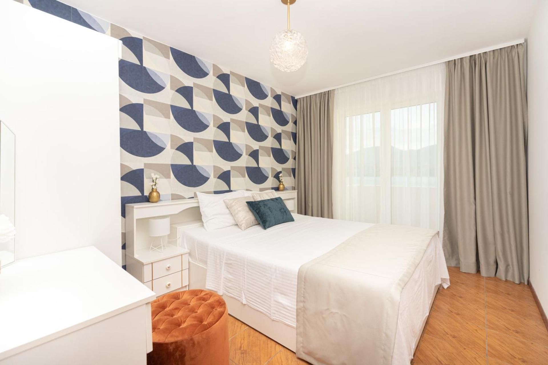 One-Bedroom Apartment with Balcony and Sea View